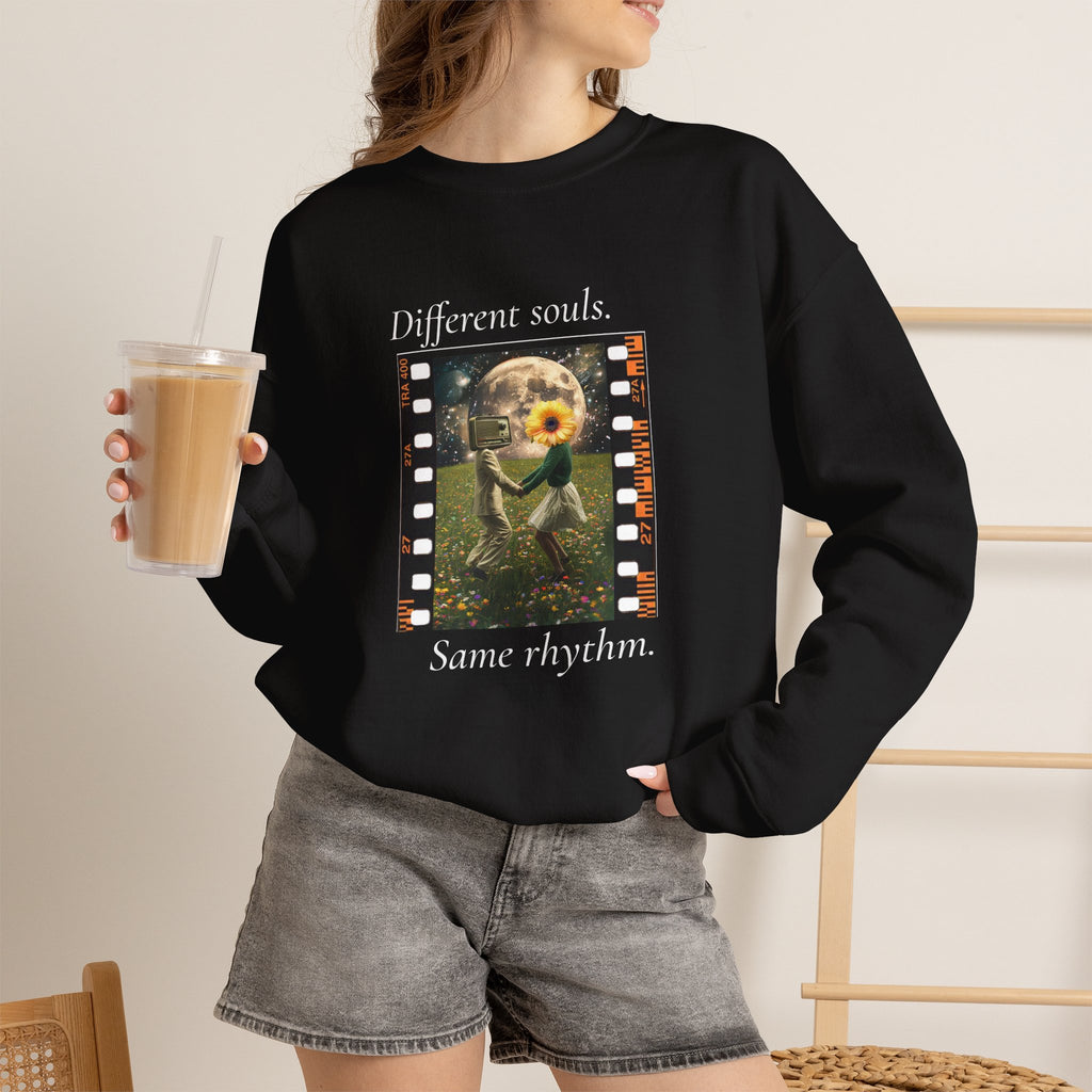 Black crewneck sweatshirt with long sleeves and colorful front graphic print