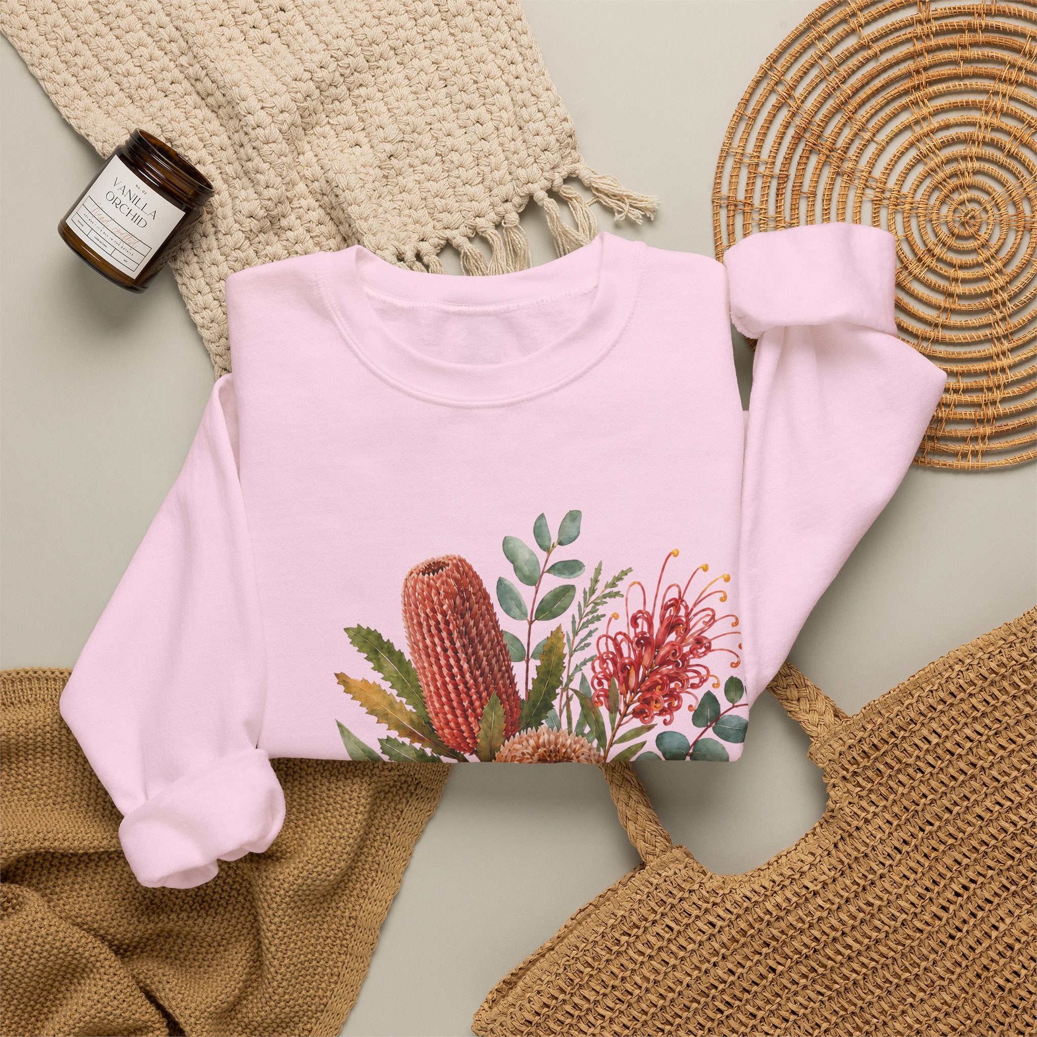 Light pink crewneck sweatshirt with floral cactus print, long sleeves