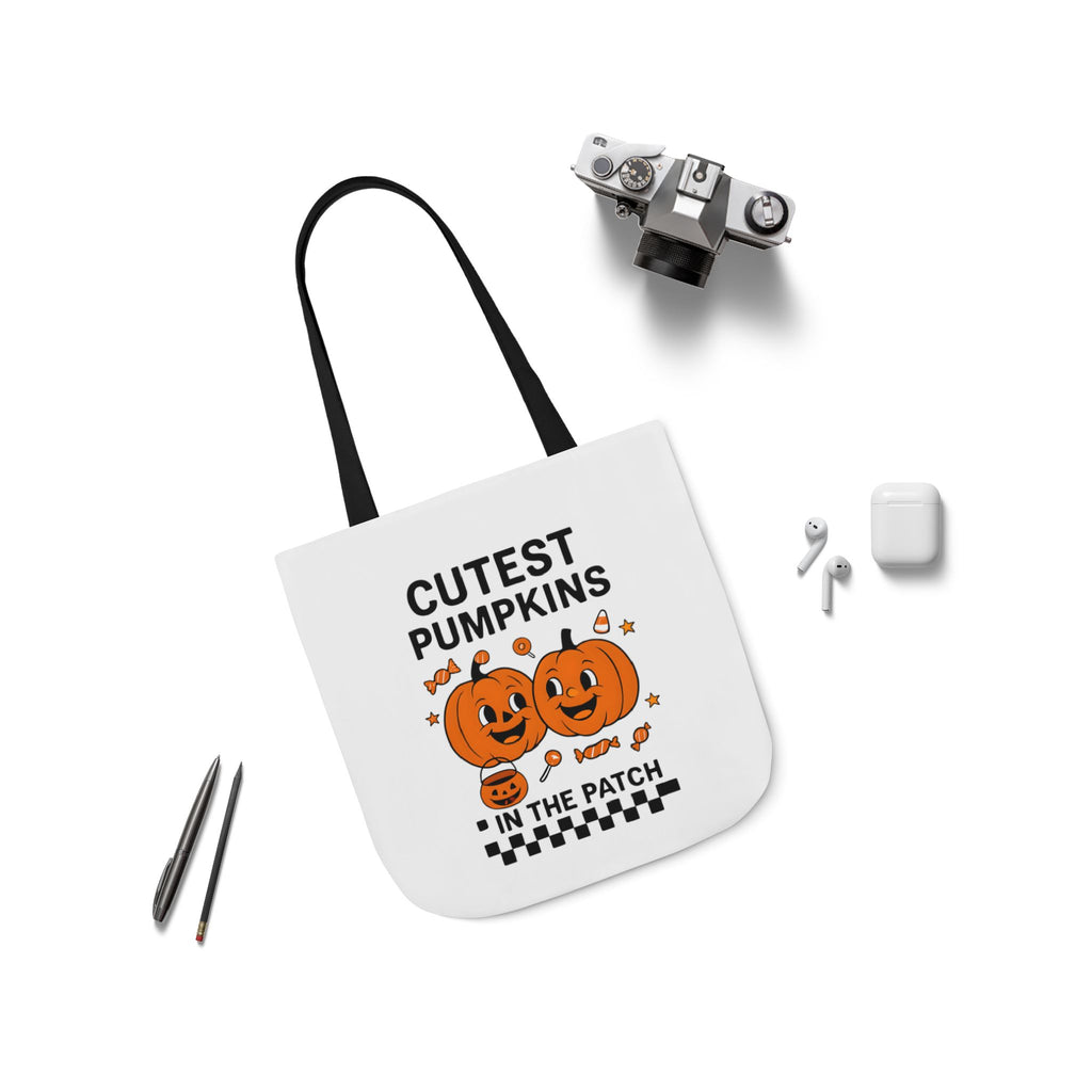 White canvas tote with black handles and pumpkin graphic reading 'CUTEST PUMPKINS IN THE PATCH'.