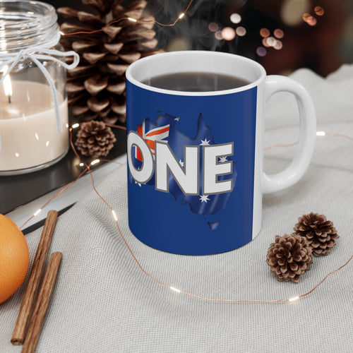 Blue ceramic coffee mug with Australia map and 'ONE' unity graphic, white handle