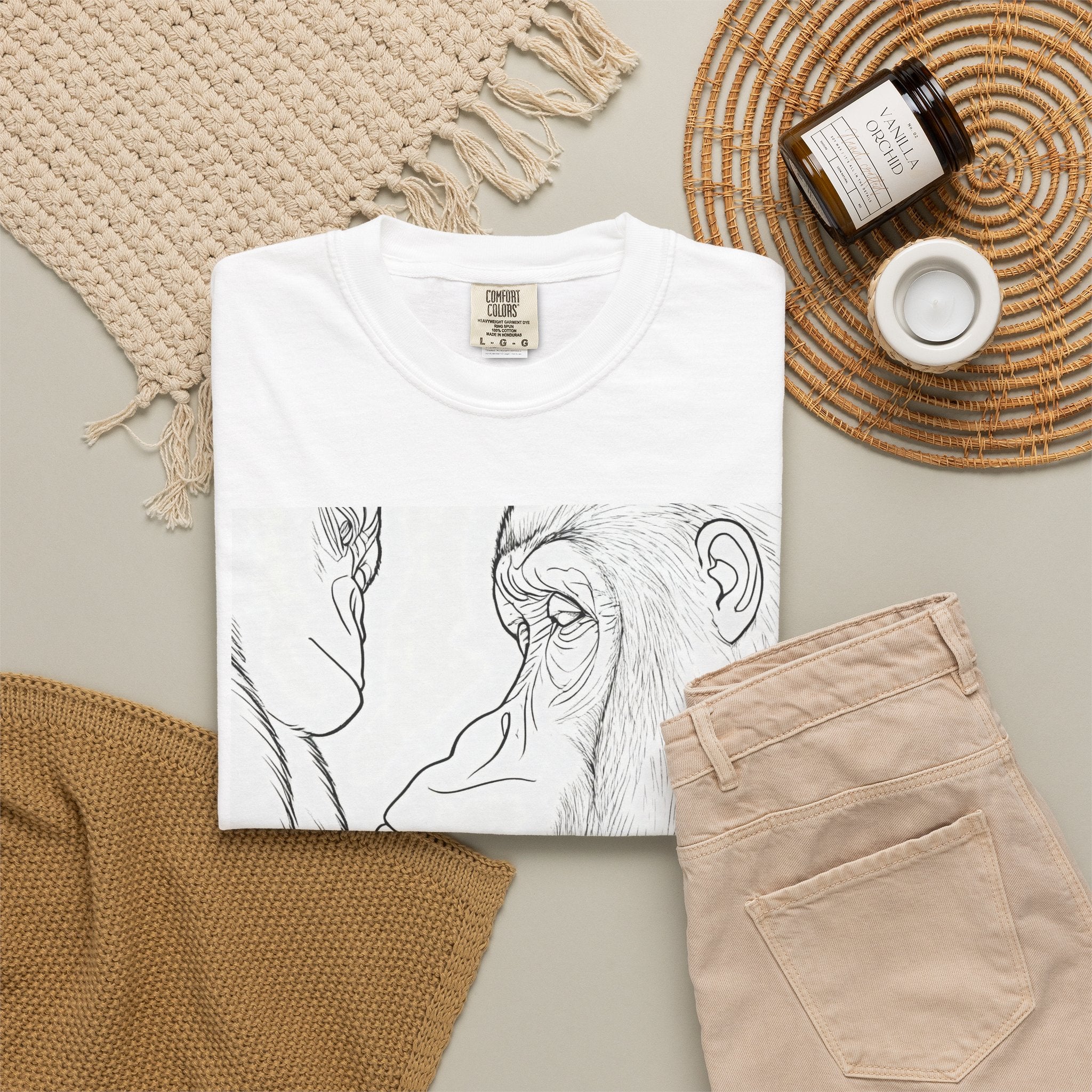 White crewneck T-shirt with black gorilla sketch portrait graphic, folded