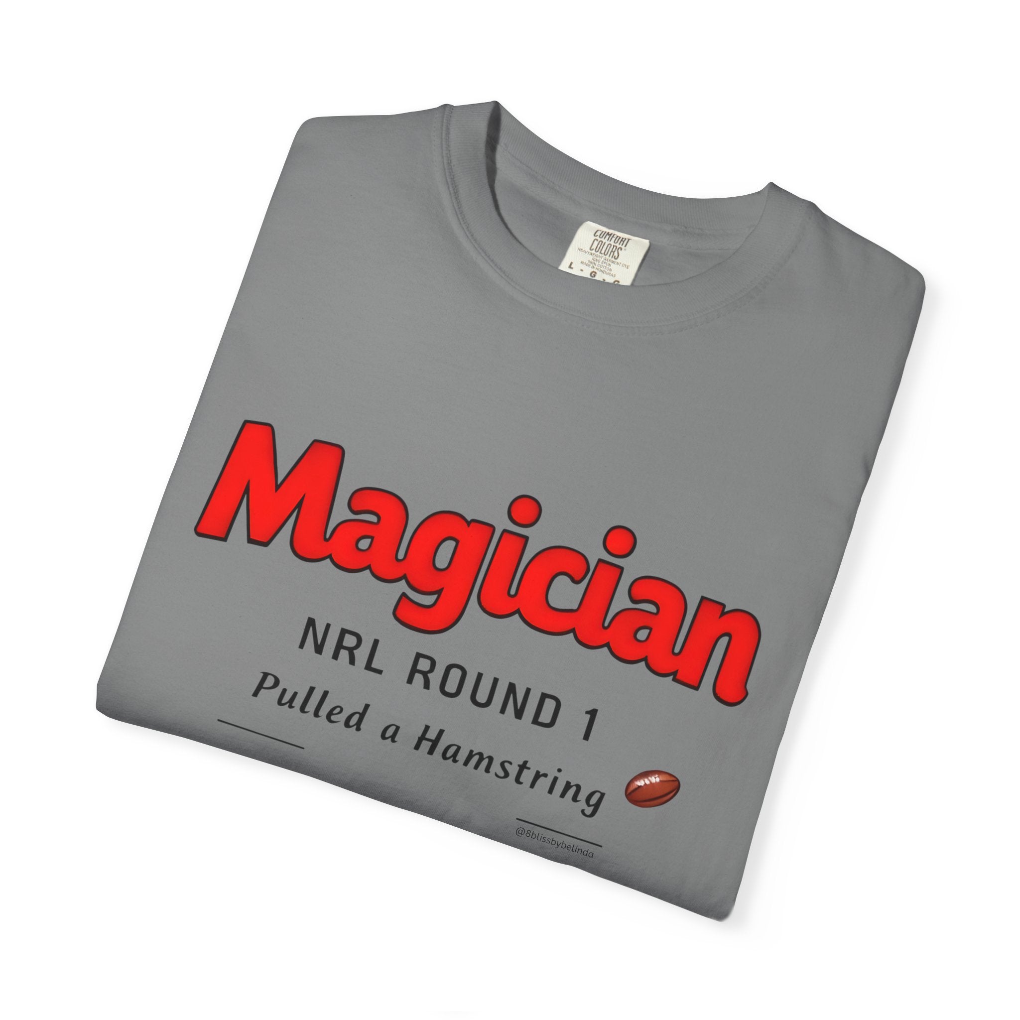 Flat-lay grey graphic round-neck T-shirt with 'Magician' NRL Round 1 lettering