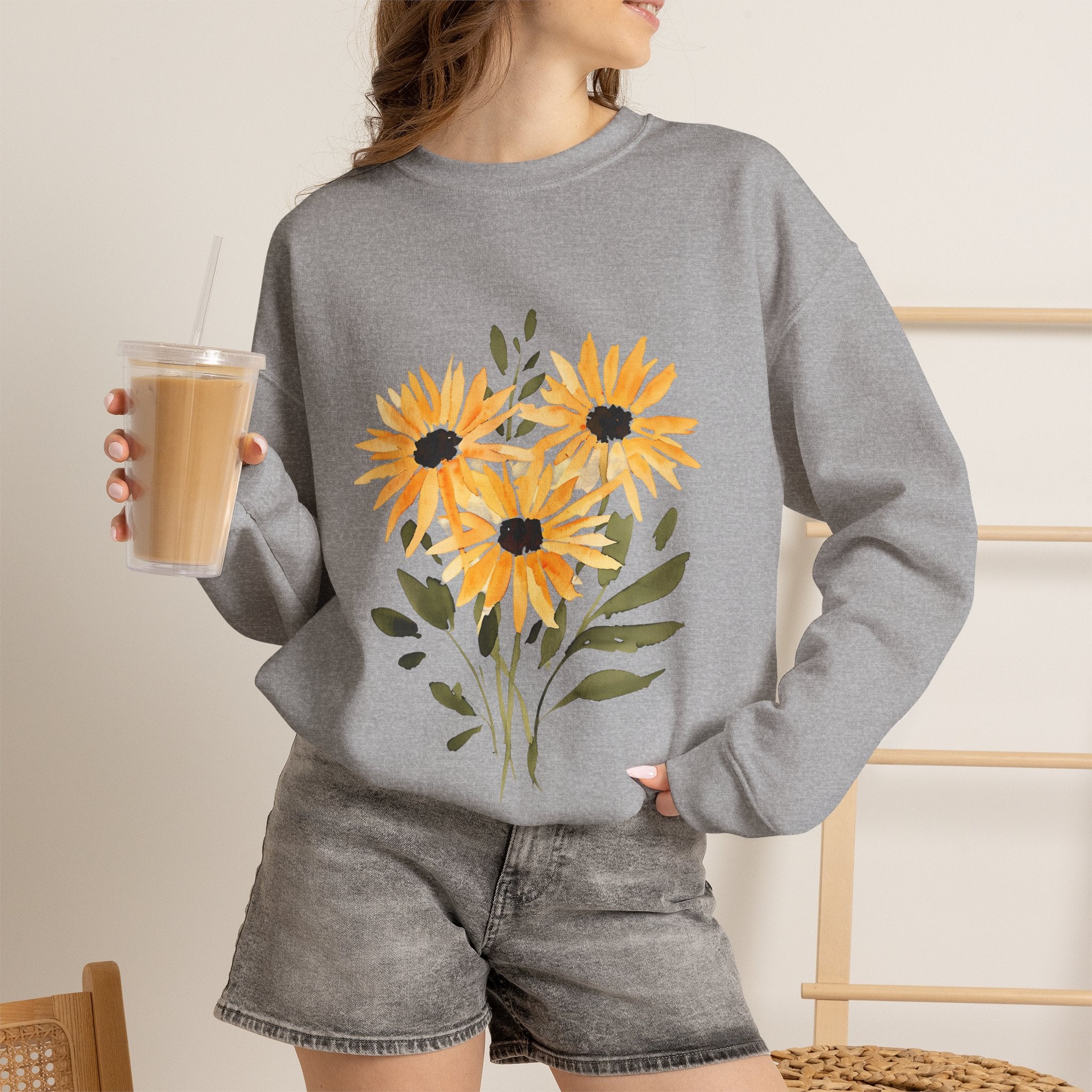 Gray crewneck sweatshirt with sunflower bouquet graphic on chest, long sleeves