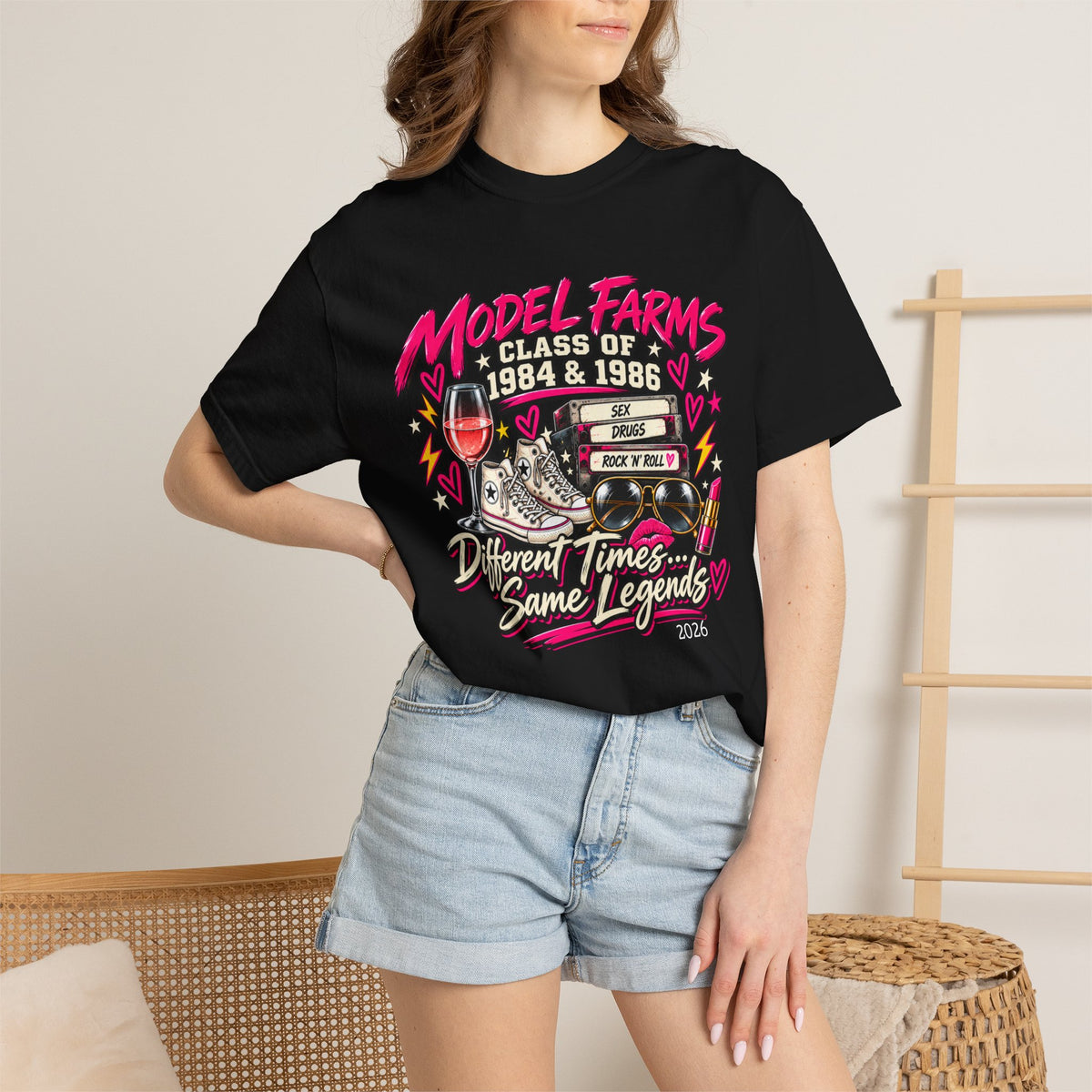 Black crewneck graphic T-shirt with colorful festival-style front print