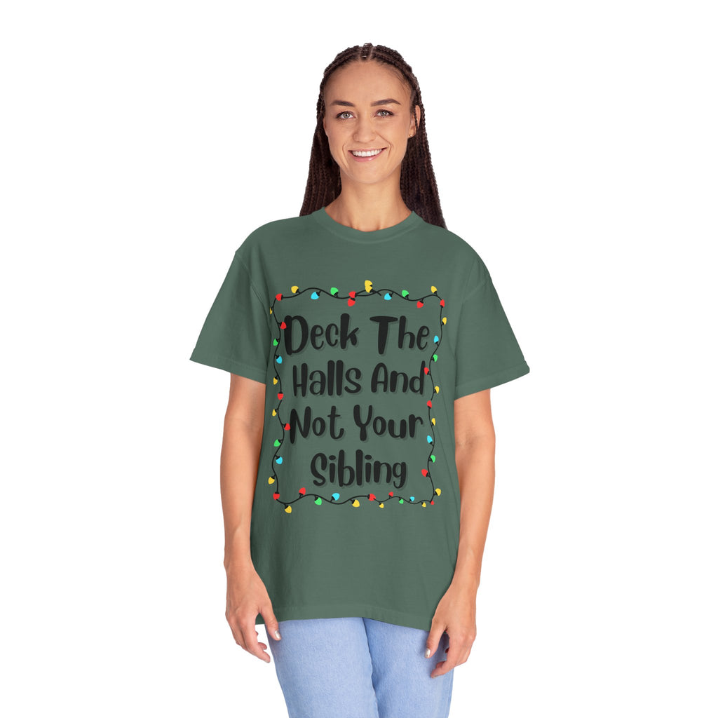Sage green T-shirt with 'Deck The Halls And Not Your Sibling' light garland graphic