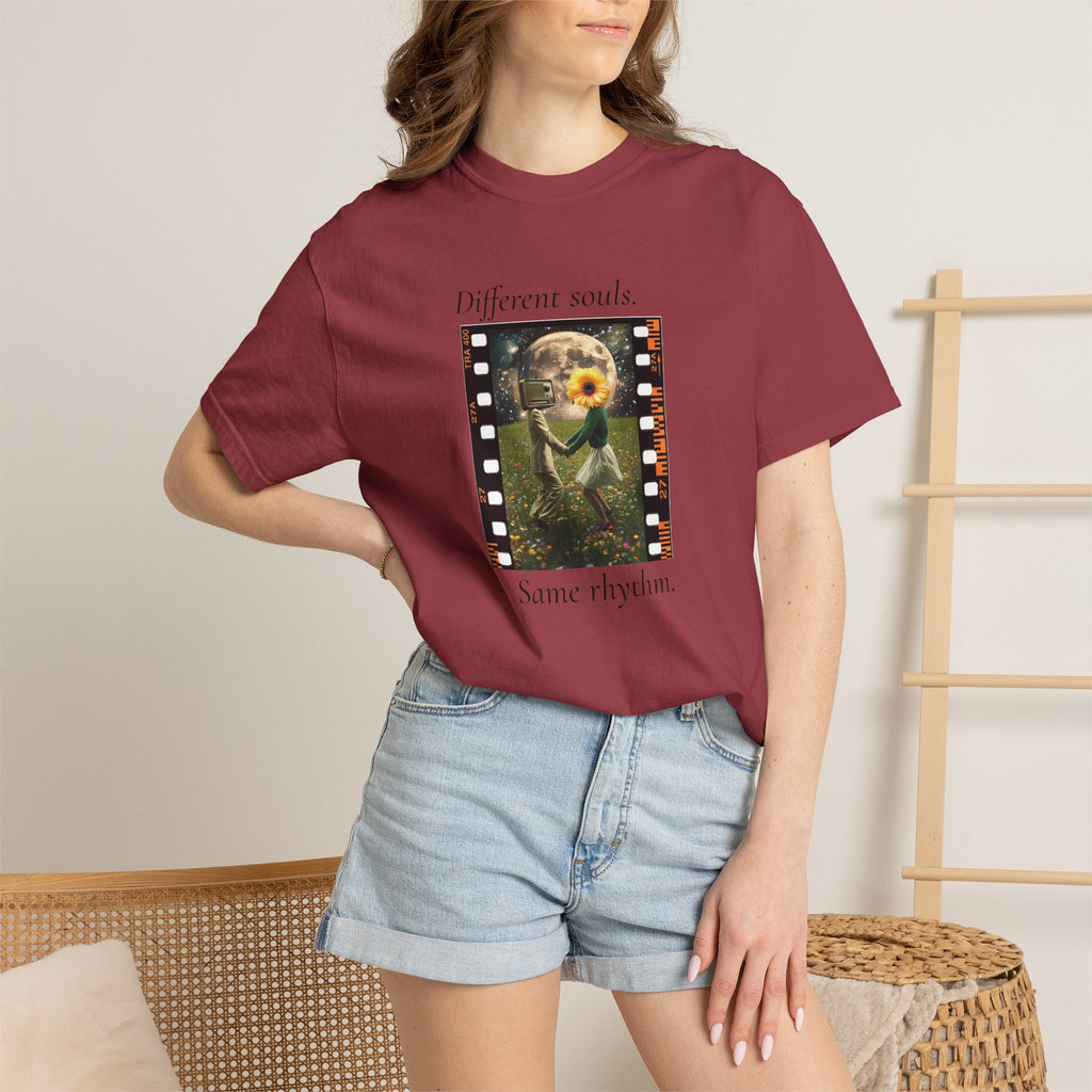 Burgundy crewneck T-shirt worn by model with filmstrip graphic on front
