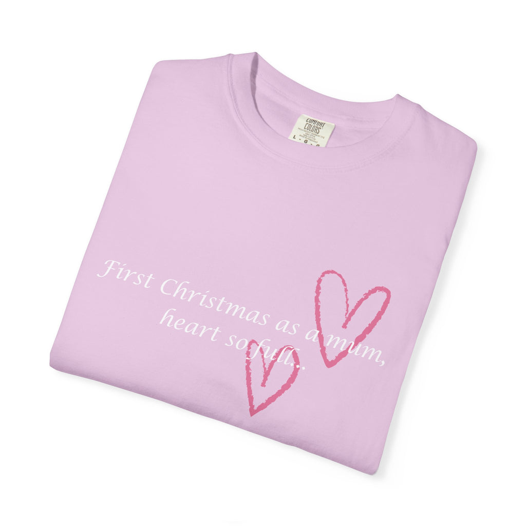 Women’s light pink graphic T-shirt with script “First Christmas as a mum” and pink heart design