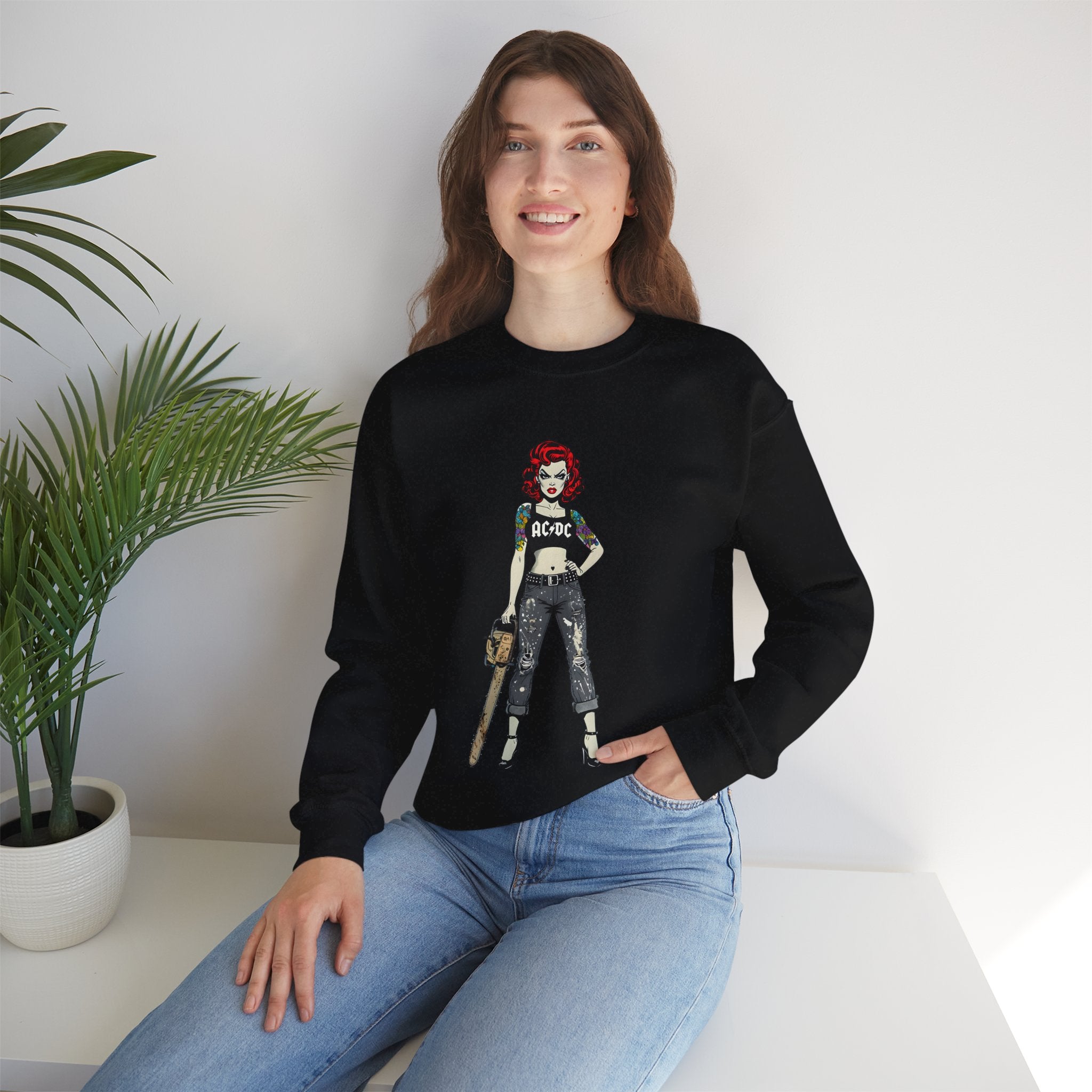 Black sweatshirt worn on model with comic-style AC/DC rock girl graphic