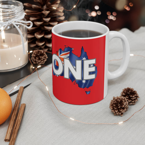 Red ceramic coffee mug with white handle and blue AU map flag “ONE” graphic