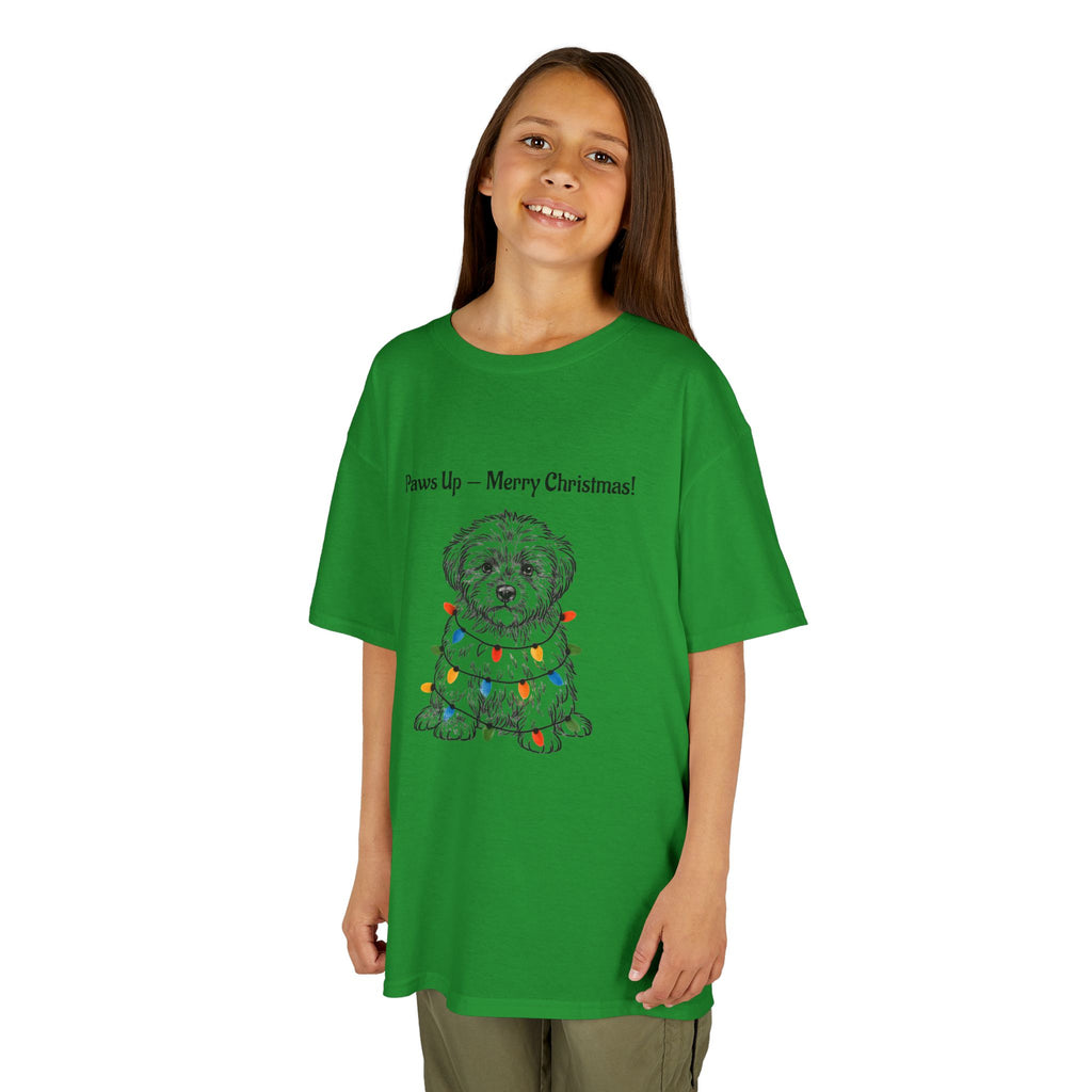 Kids green T-shirt worn by child, with Paw-sit dog Christmas graphic and text