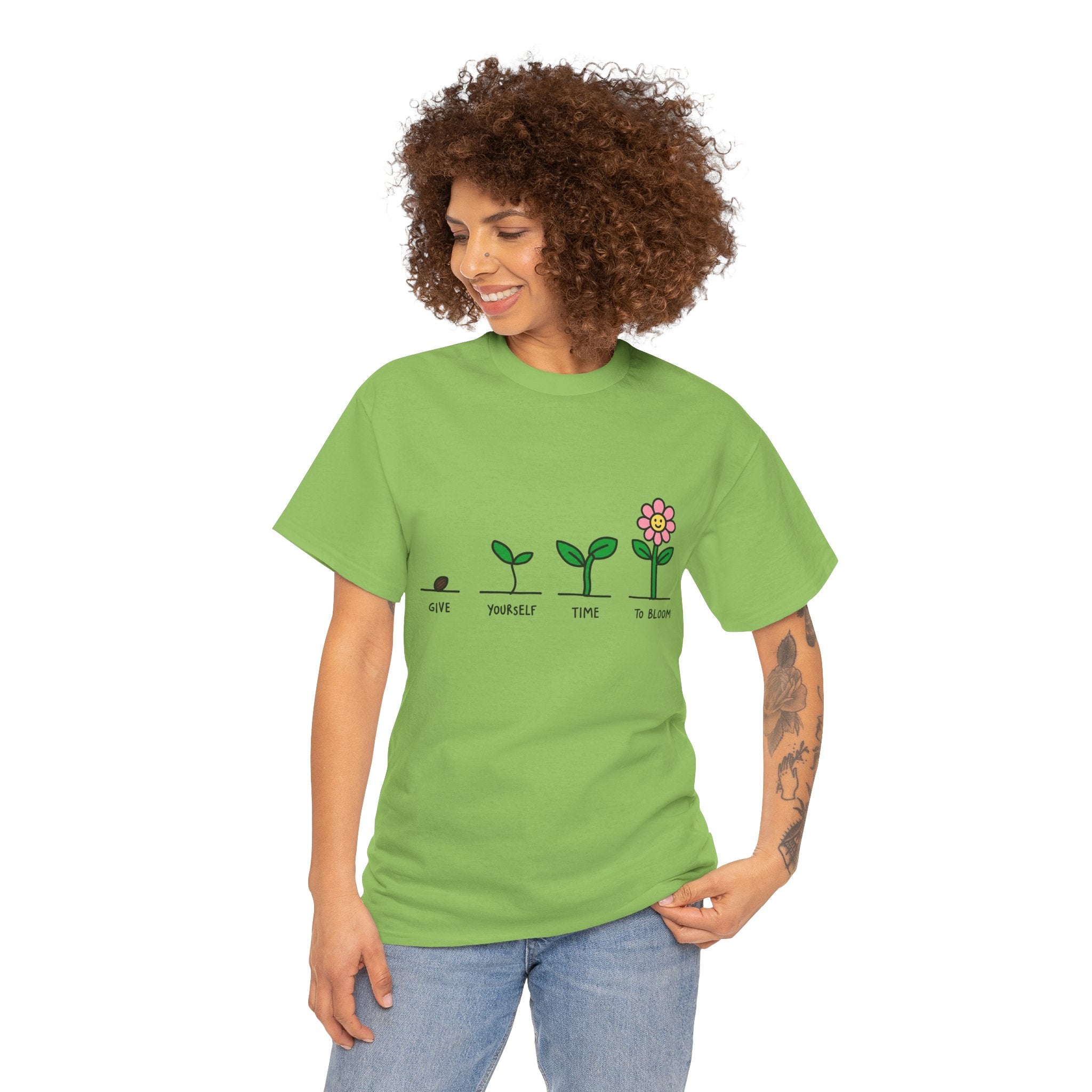 Green short-sleeve T-shirt on model with sprout-and-flower growth graphic
