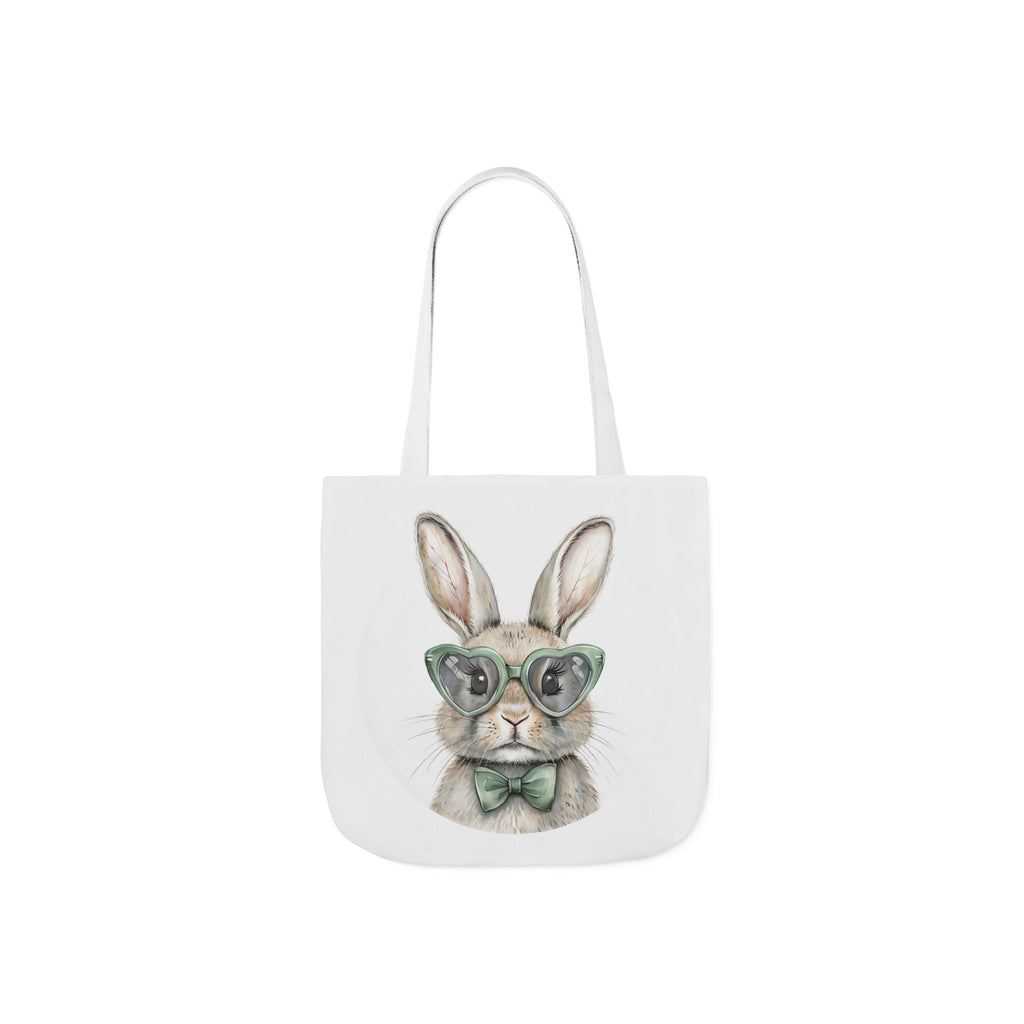 White canvas tote bag with centered bunny wearing green glasses and bow, front view