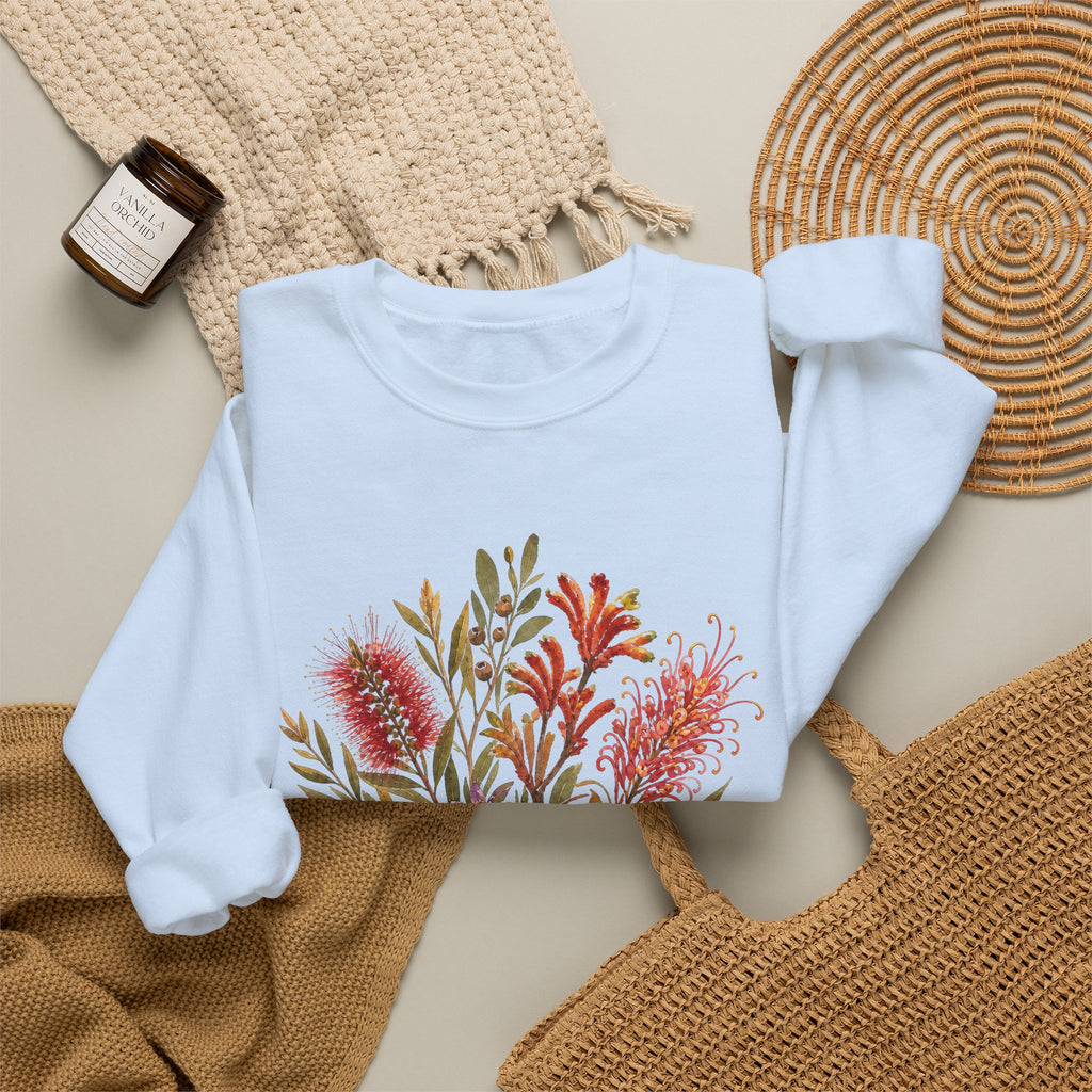 Light blue crewneck sweatshirt with colorful botanical bouquet on chest