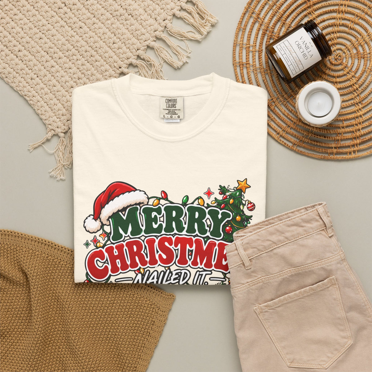 White crew-neck Christmas T-shirt with “Merry Christmas” graphic and holiday ornaments