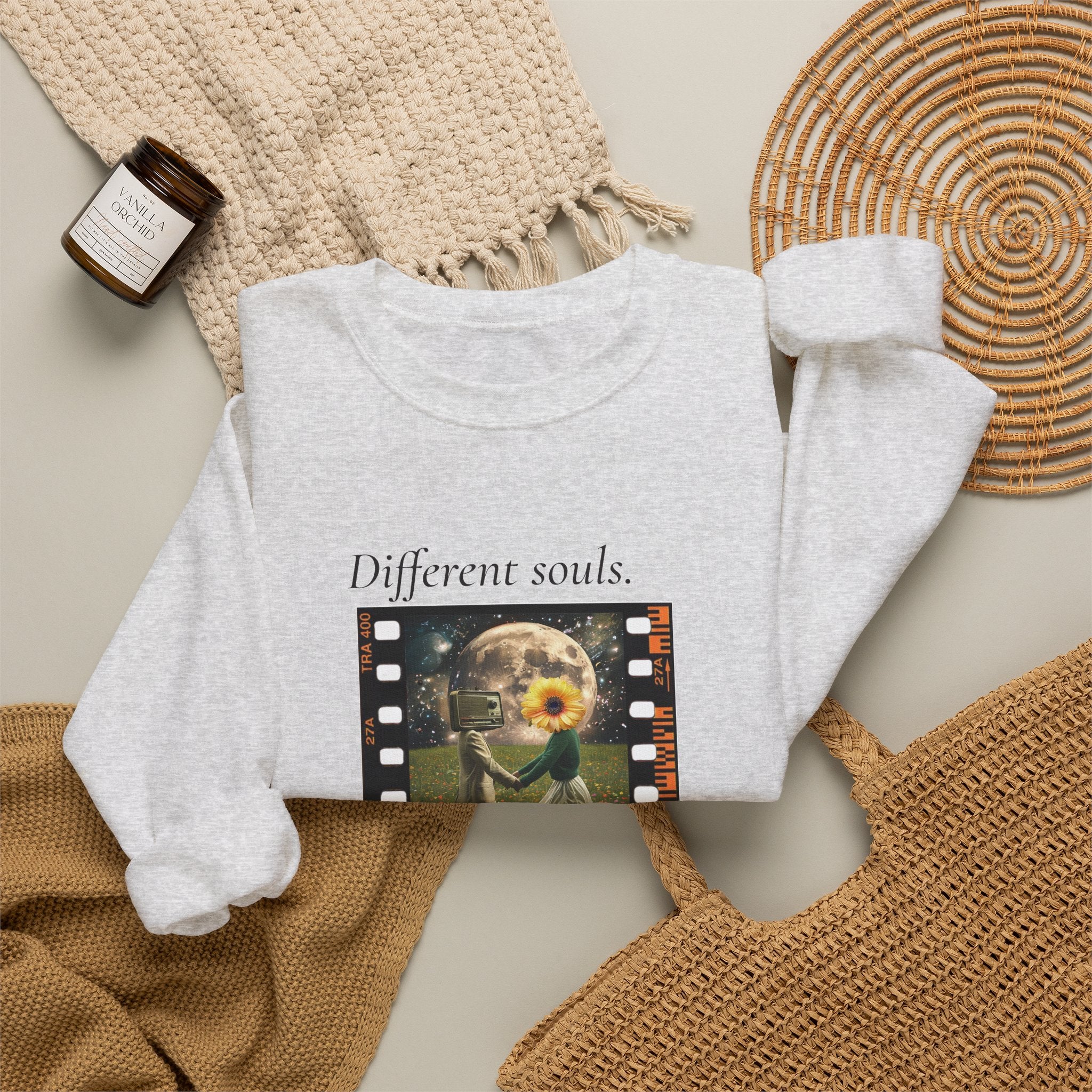 Light gray crewneck sweatshirt with “Different souls.” filmstrip graphic