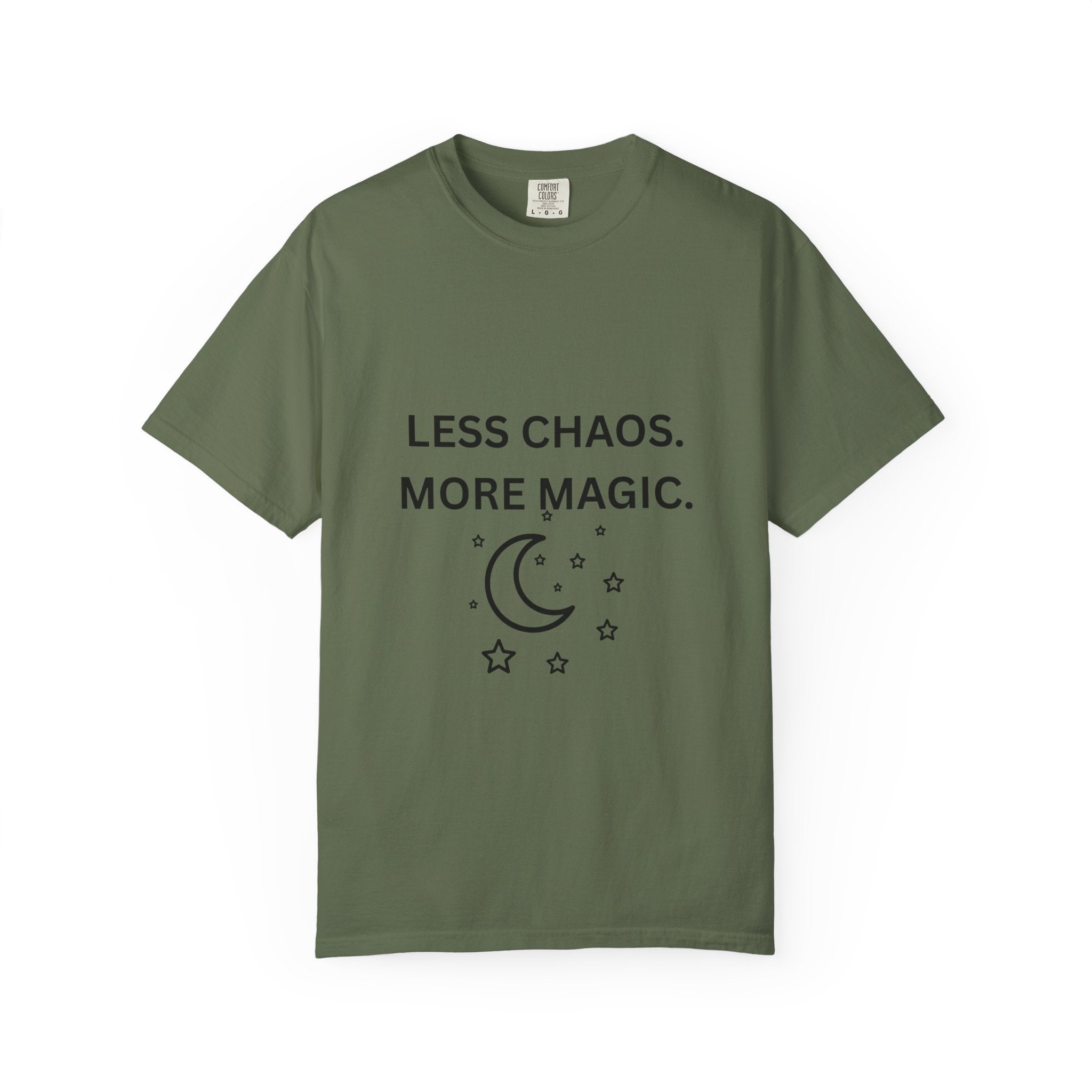 Sage green graphic t-shirt with 'LESS CHAOS. MORE MAGIC.' and crescent moon stars print