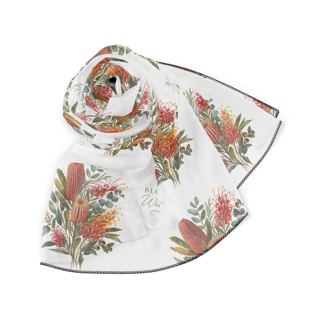 Lightweight floral scarf draped, white with orange and pink wildflower bouquet print