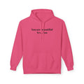 Pink unisex hoodie with front text graphic, pullover hood and kangaroo pocket