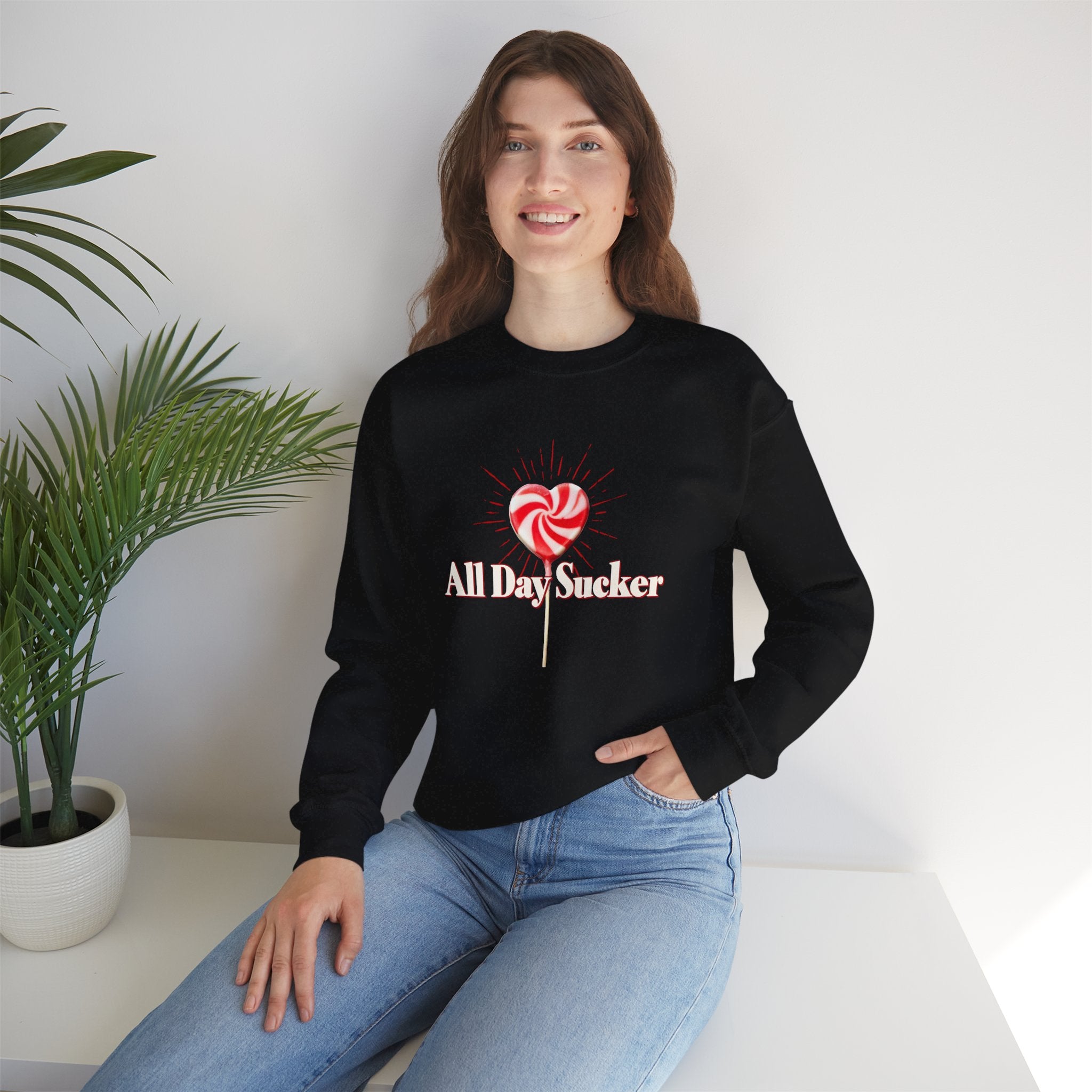 Black graphic lollipop heart sweatshirt with red and white candy design