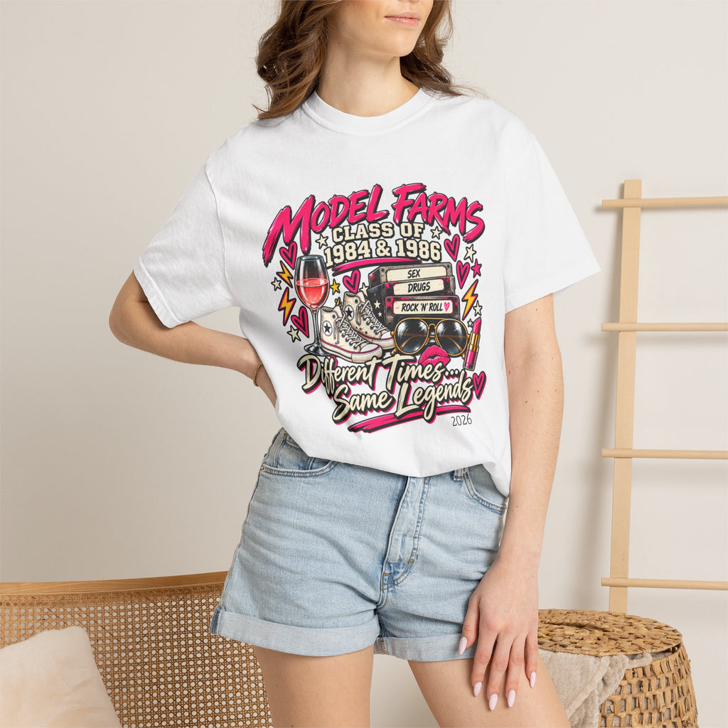 White crewneck T-shirt with colorful retro class graphic worn with denim shorts