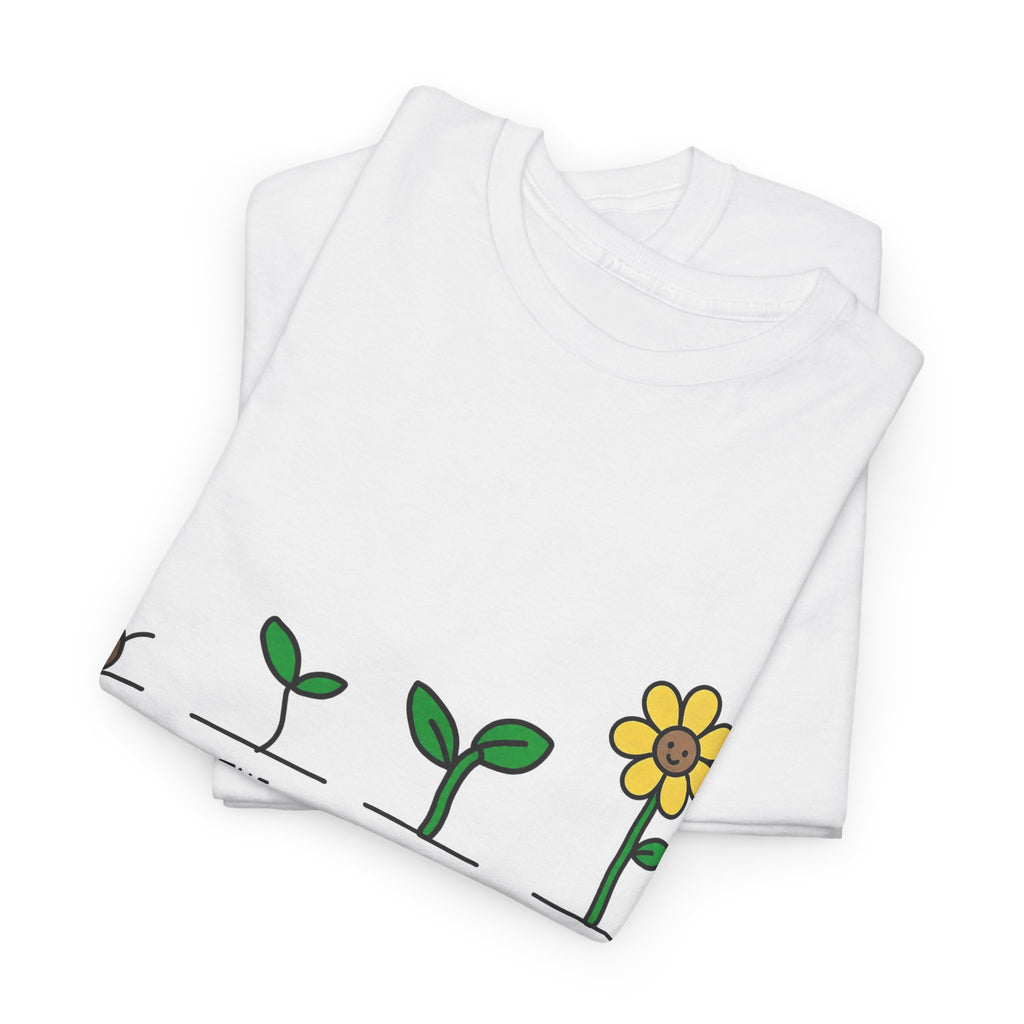 White T-shirt with sprout-to-flower graphic and message text across the chest