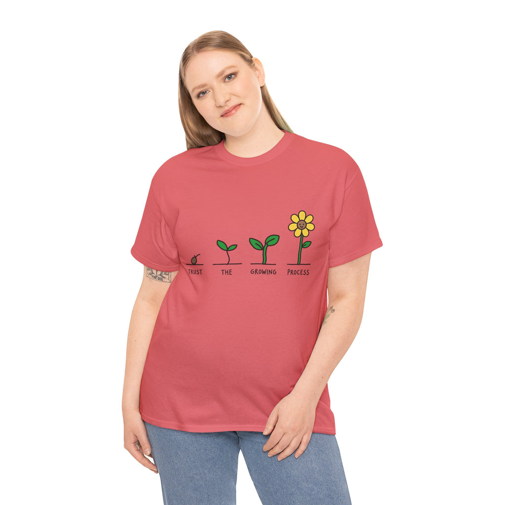 Coral red crewneck t-shirt on model with “Trust the Growing Process” plant graphic