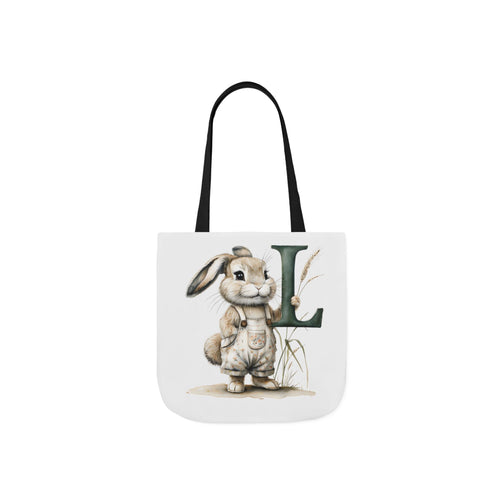Canvas tote bag with bunny holding letter L, black handles, front print.