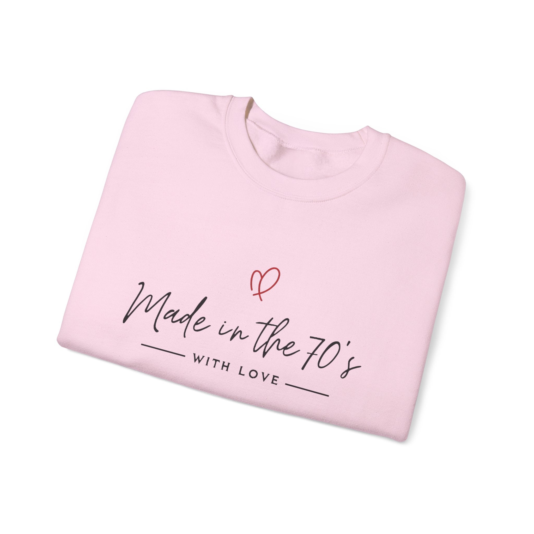 Unisex crewneck sweatshirt, light pink with “Made in the 70’s” heart graphic