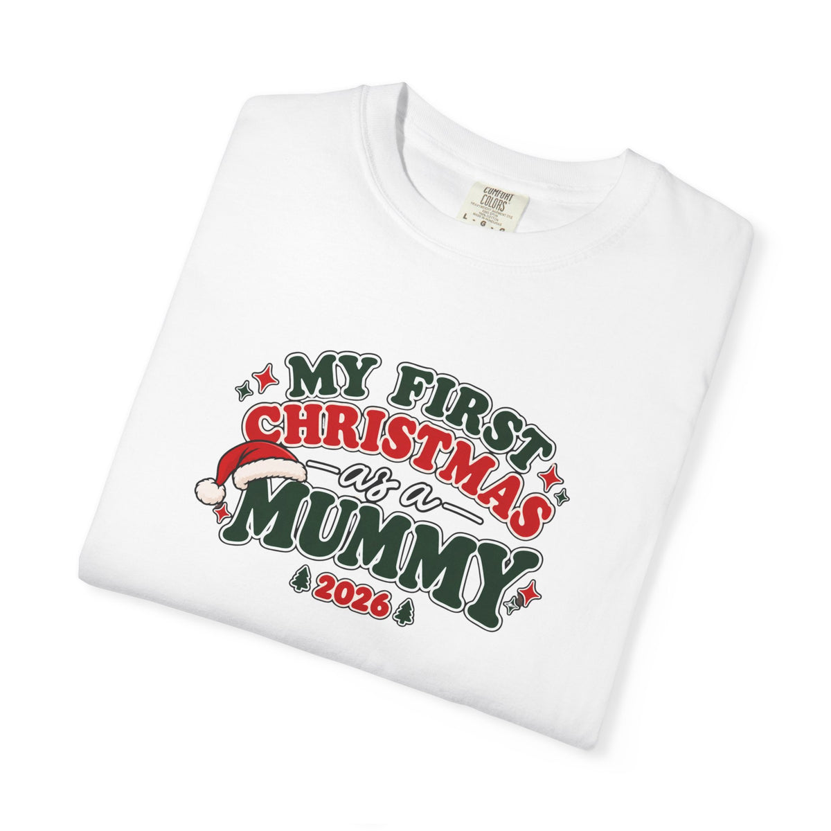 White T-shirt folded with 'My First Christmas as a Mummy 2026' colorful graphic