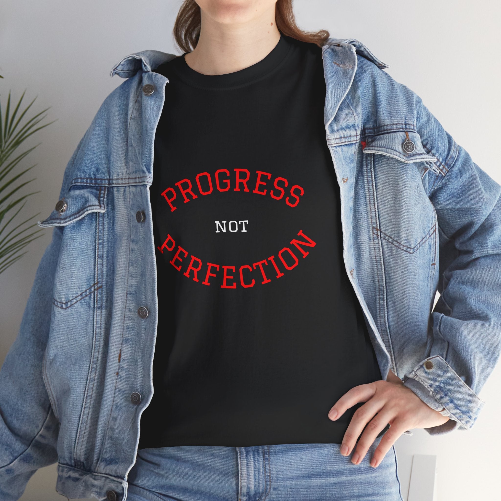 Black unisex cotton tee with red "PROGRESS" and "PERFECTION" slogan graphic