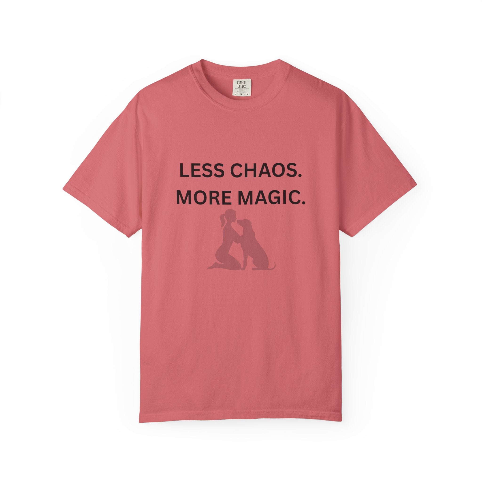 Women’s coral/red T-shirt with “LESS CHAOS. MORE MAGIC.” text and dog silhouette graphic