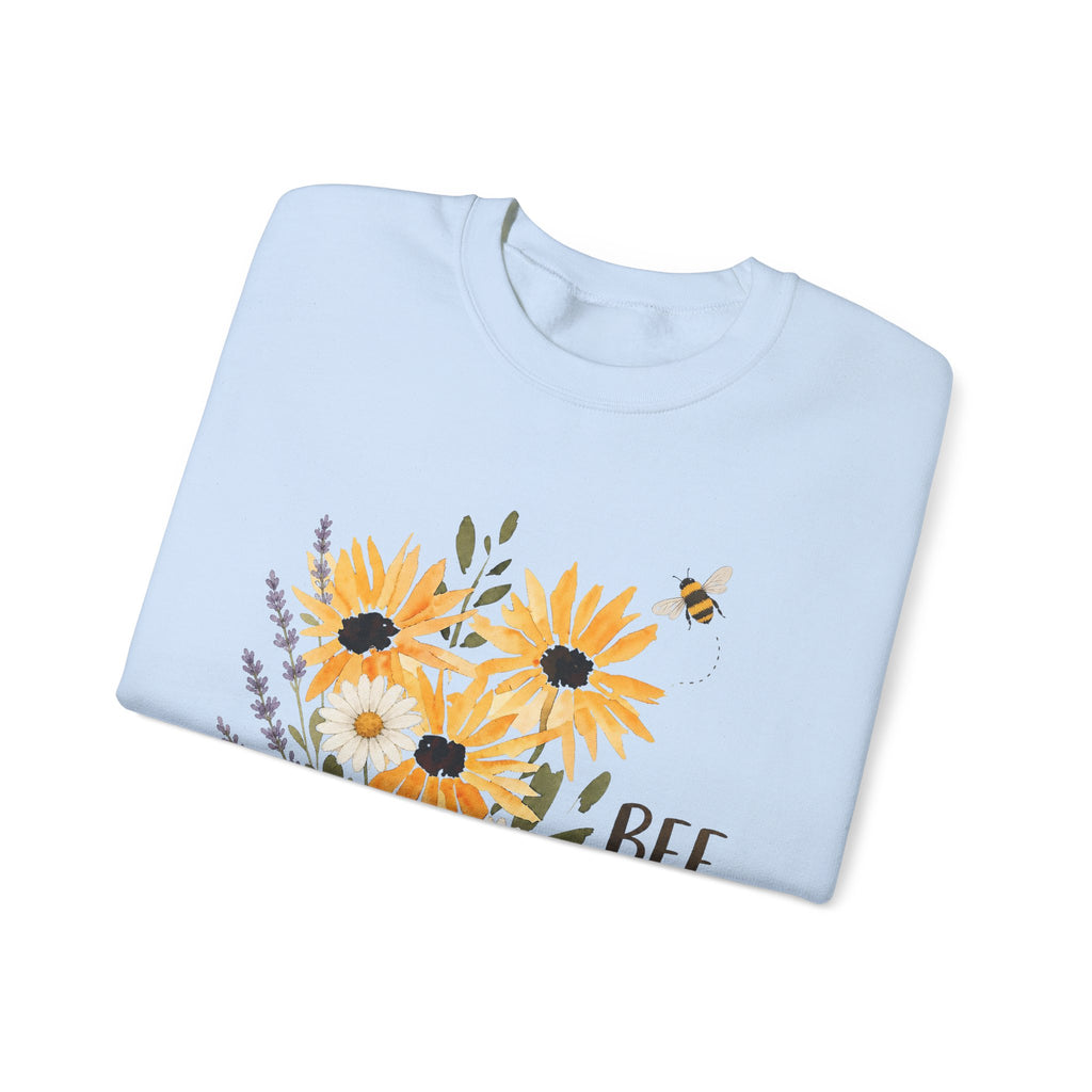 Light blue crewneck sweatshirt with sunflower bouquet, bees, and floral graphic on front