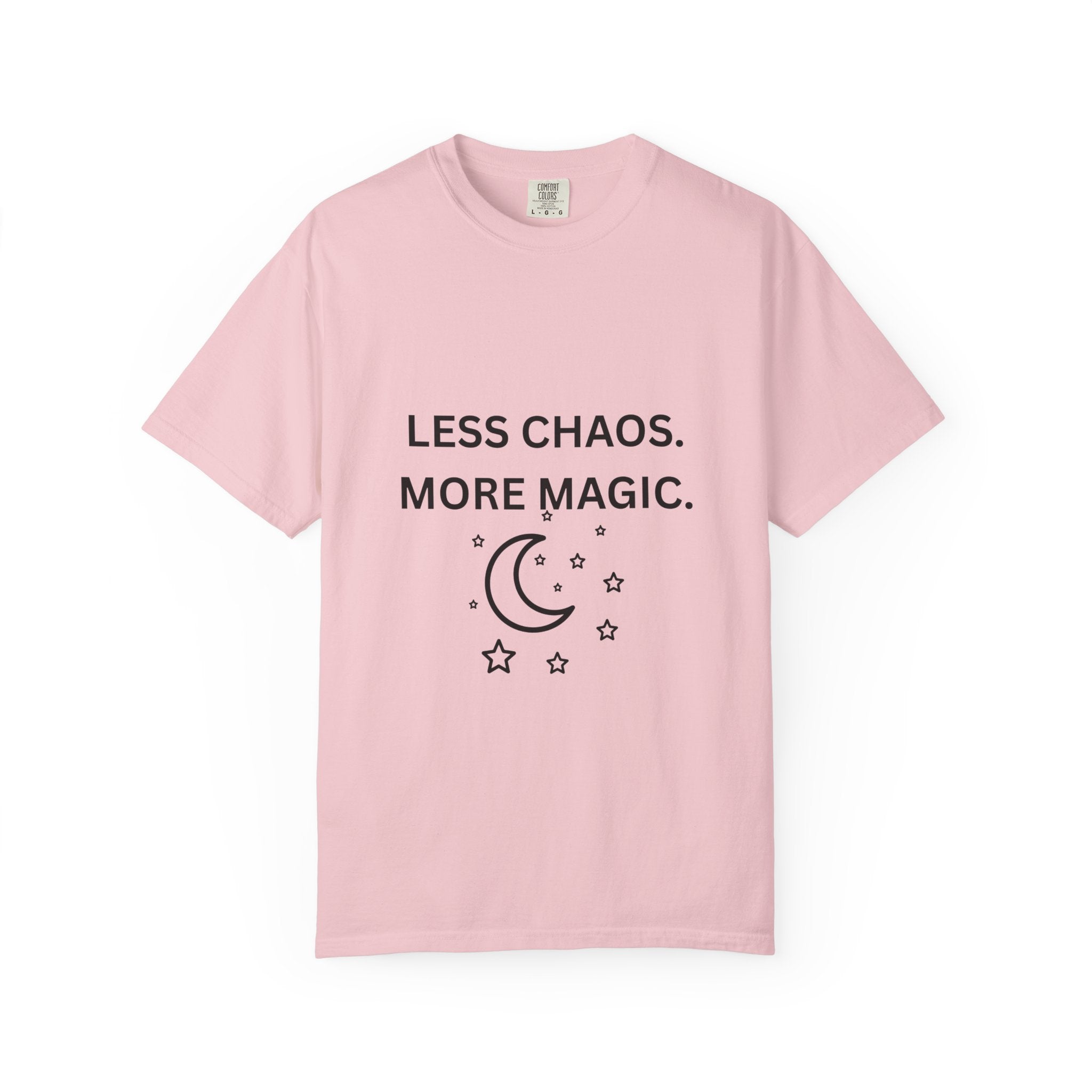 Pink T-shirt with “LESS CHAOS. MORE MAGIC.” moon and stars graphic