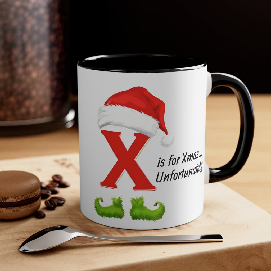 Christmas letter X mug, white with black inside and handle; red X and Santa-hat graphic.