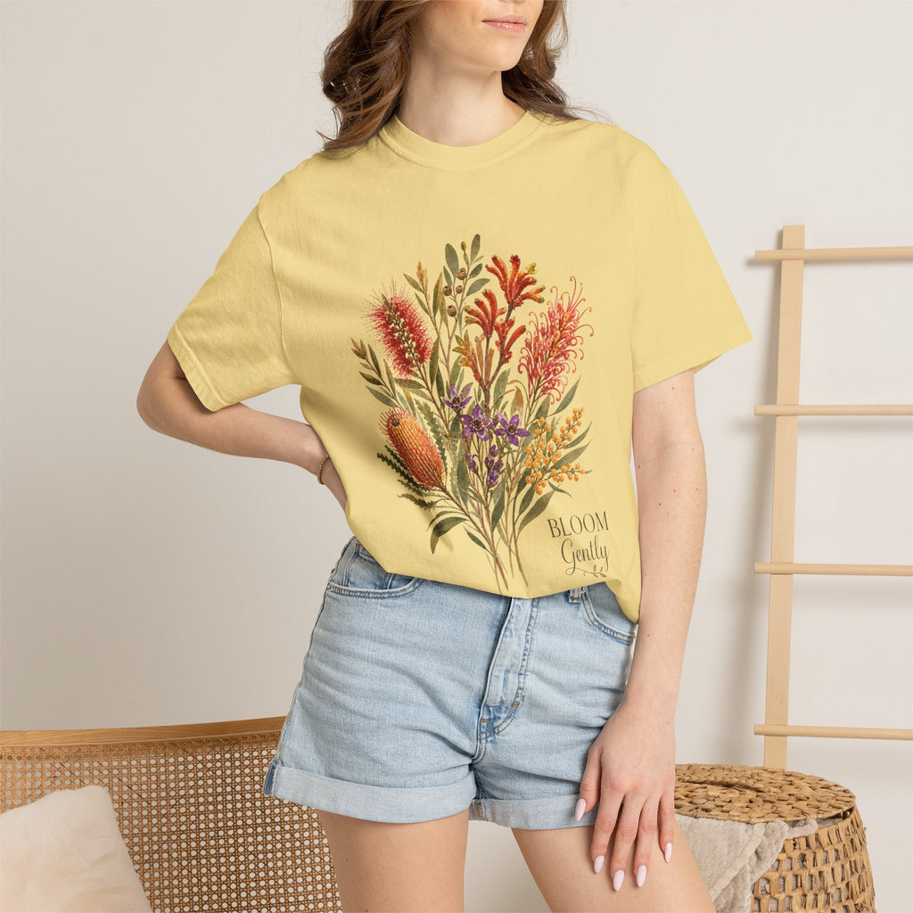 Butter yellow floral bouquet graphic t-shirt with “Bloom Gently” text on the chest.