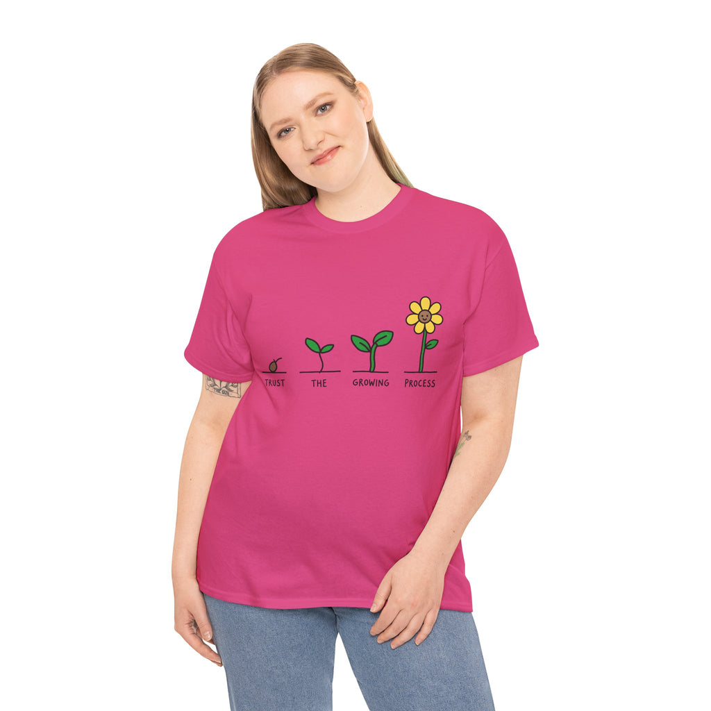 Pink crew-neck T-shirt with seedling-to-flower graphic and 'Trust the Growing Process' text