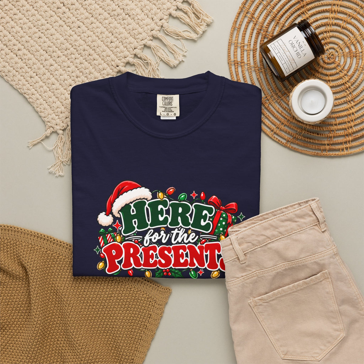 Navy crew-neck T-shirt featuring the holiday graphic "Here for the Presents"
