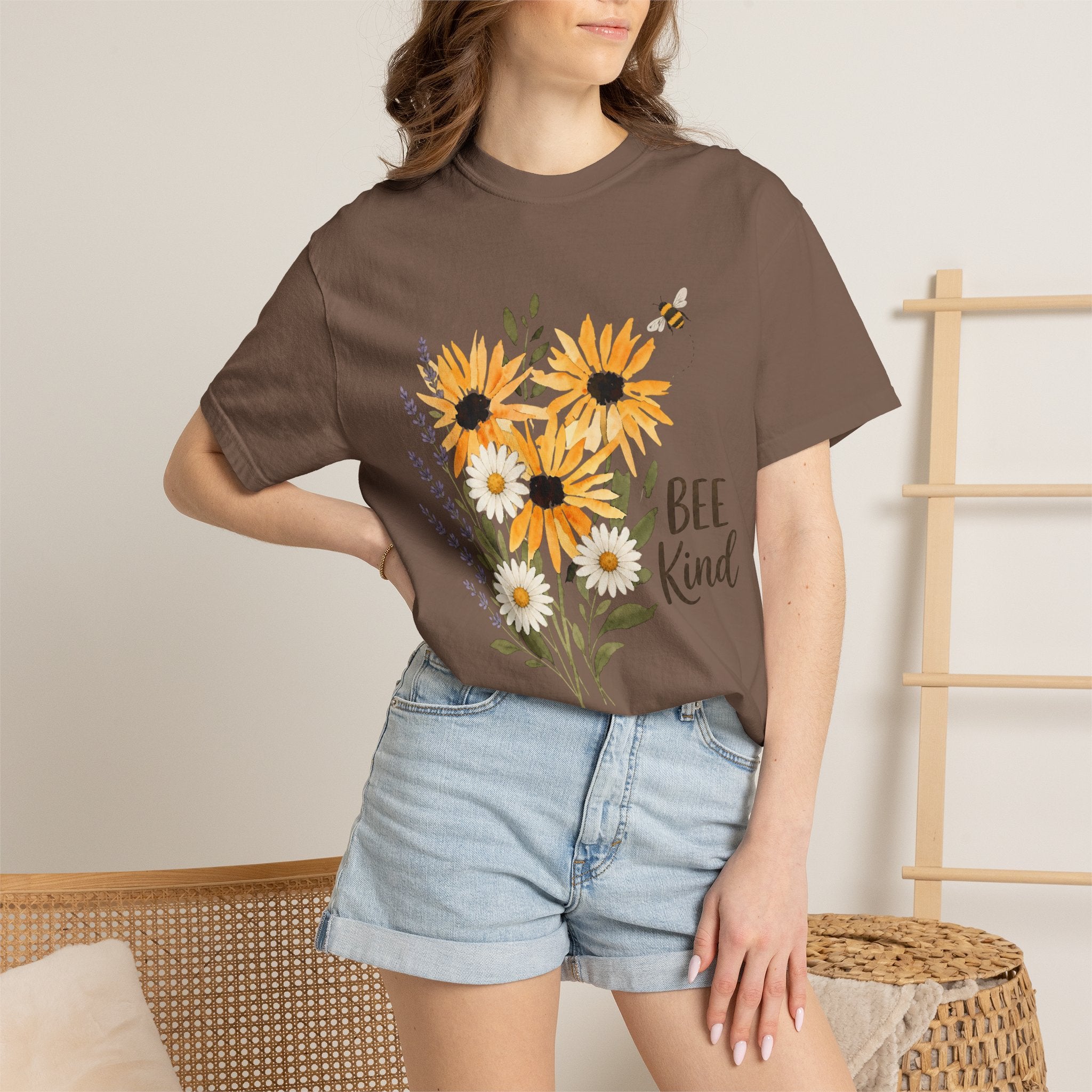 Brown t-shirt with sunflower and lavender bouquet graphic and 'Bee Kind' text