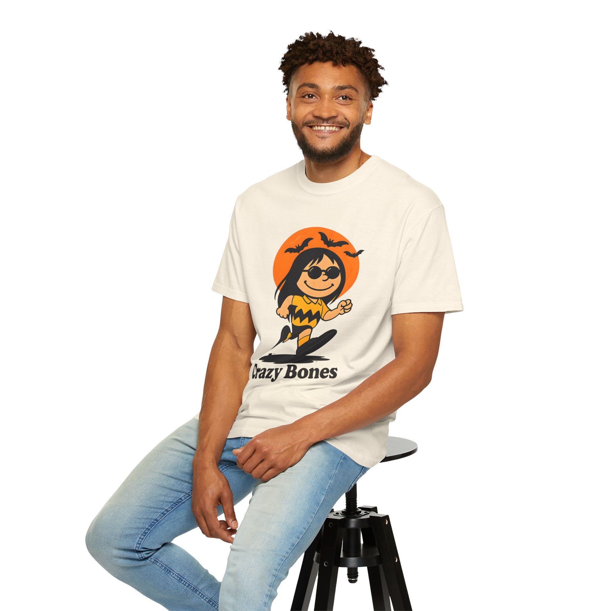 Ivory unisex T-shirt with orange Halloween witch cartoon graphic on front