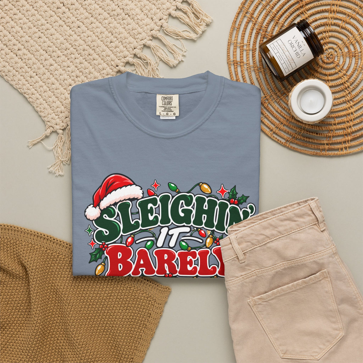 Blue jean crew-neck T-shirt with 'Sleighin' It Barely' holiday graphic