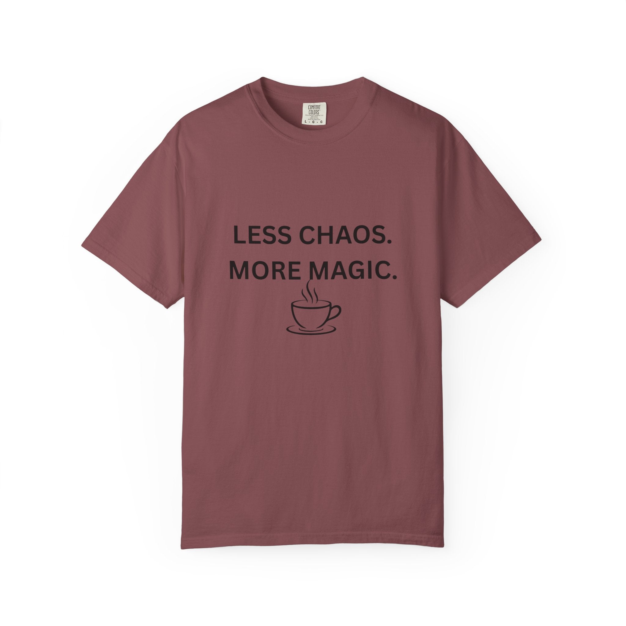 Burgundy T-shirt with “LESS CHAOS. MORE MAGIC.” text and a coffee cup graphic