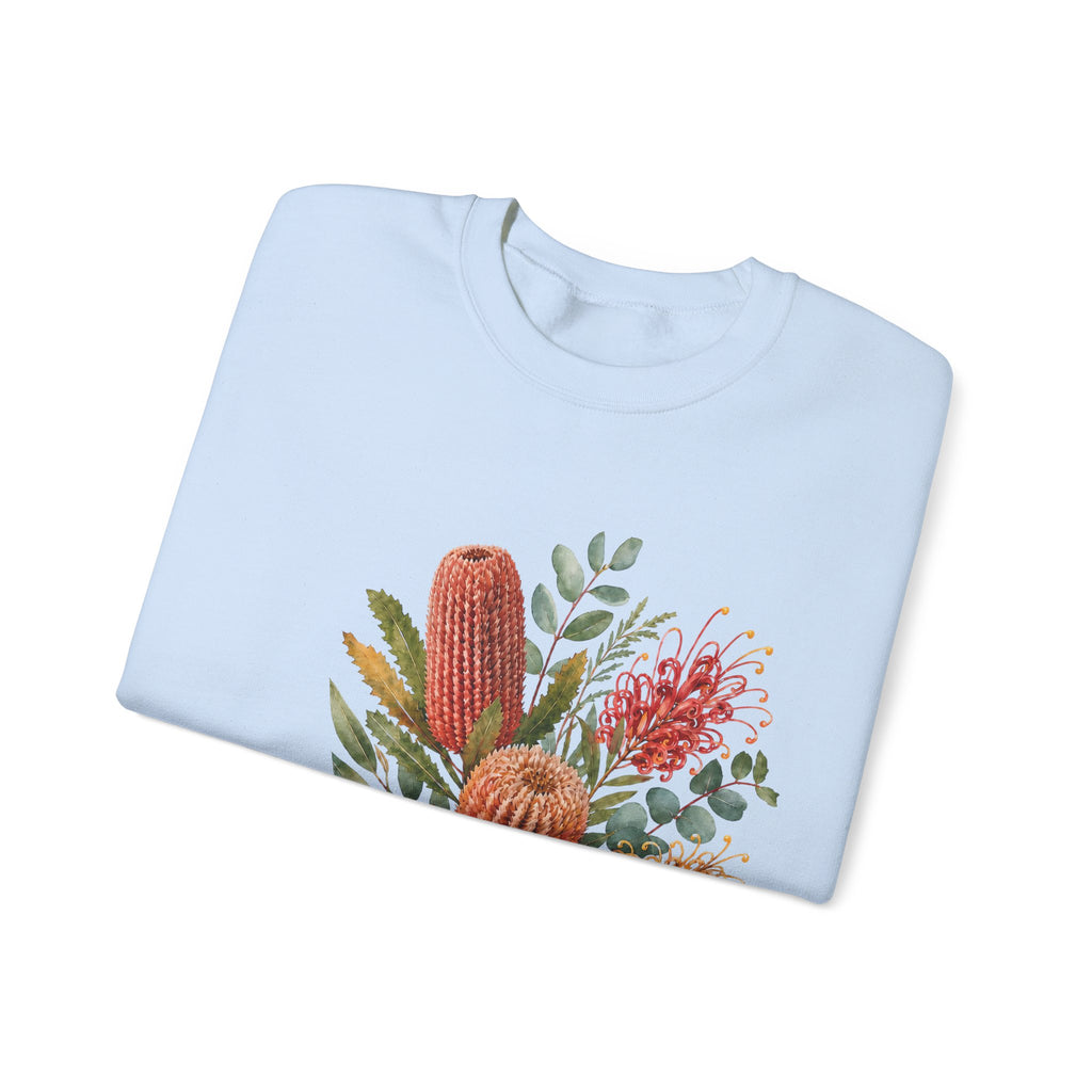 Light blue crewneck sweatshirt with colorful floral cactus graphic on chest