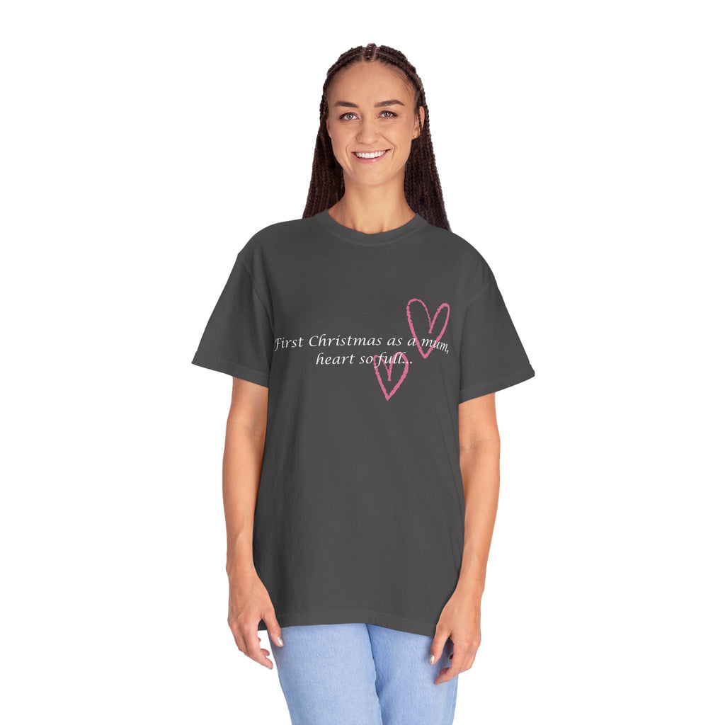 Black Christmas mum heart T-shirt worn by model with pink “First Christmas as a mum” graphic