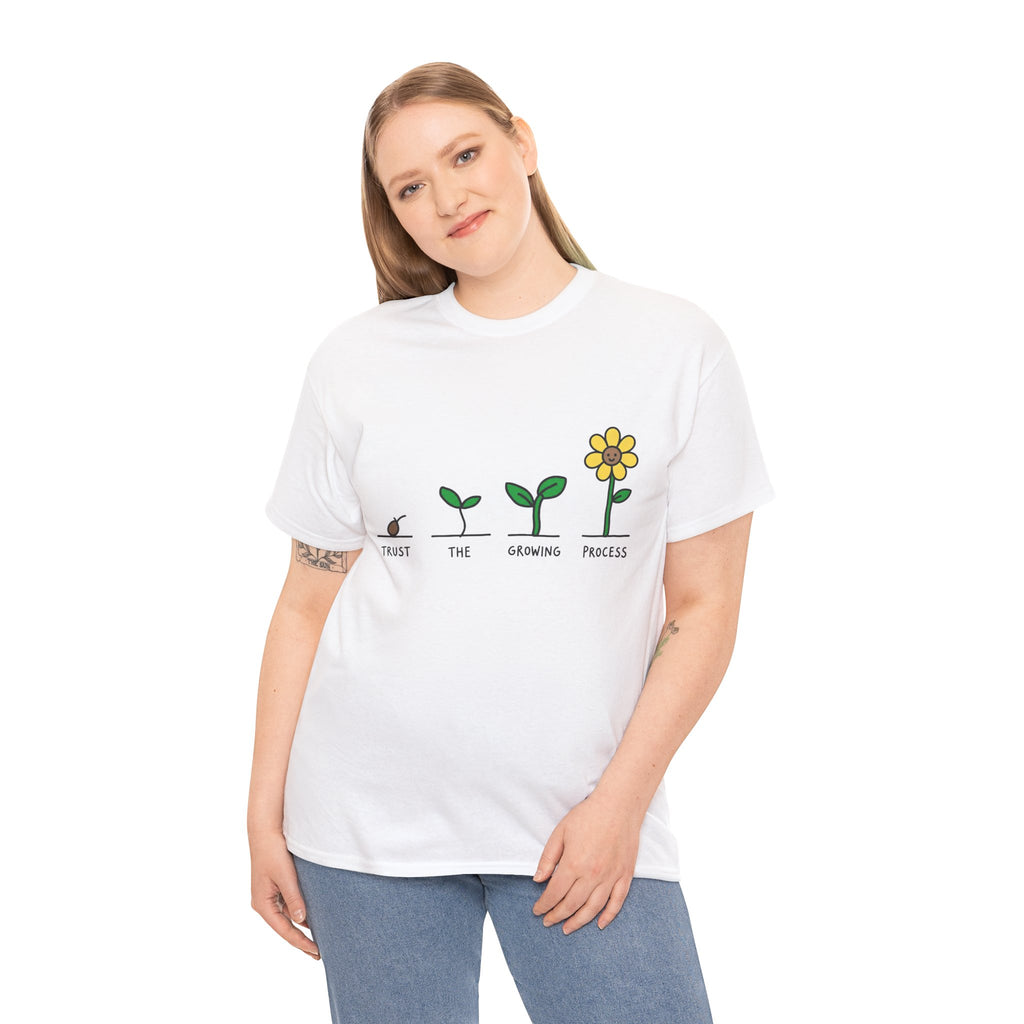 White T-shirt worn by model with sprout-to-flower graphic and message text across the chest