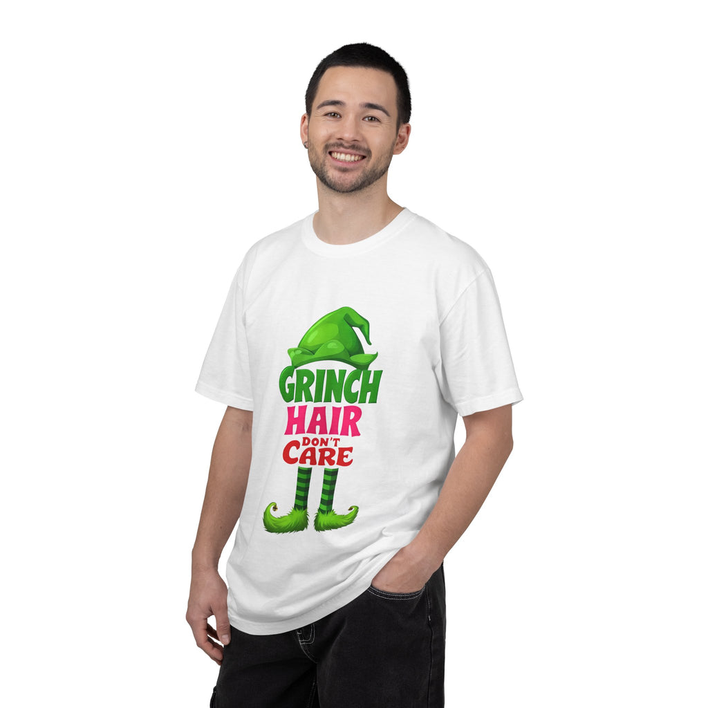 White graphic t-shirt on model featuring green “Hair Don’t Care” character print