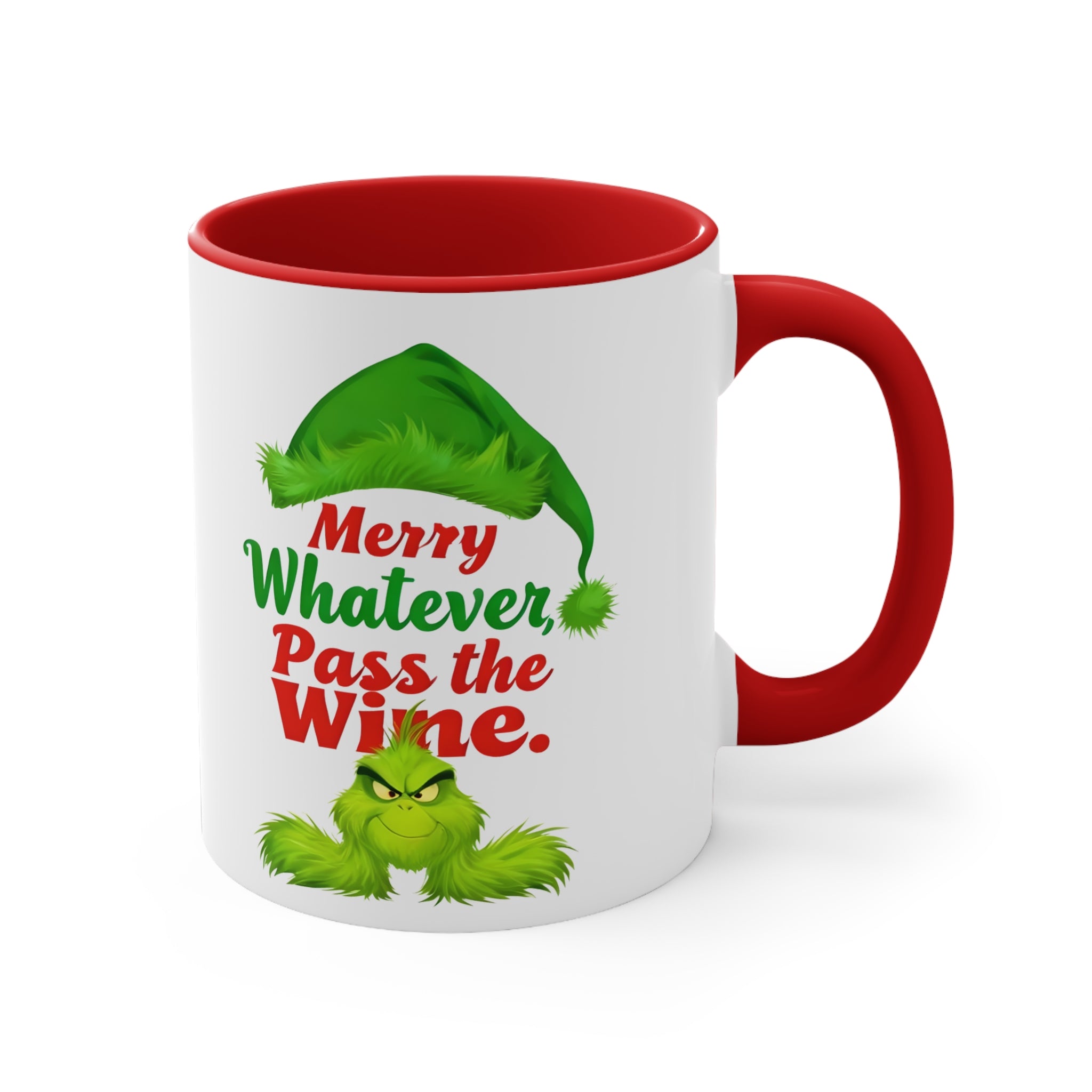 White mug with red rim and handle, green holiday character, 'Merry Whatever Pass the Wine.'