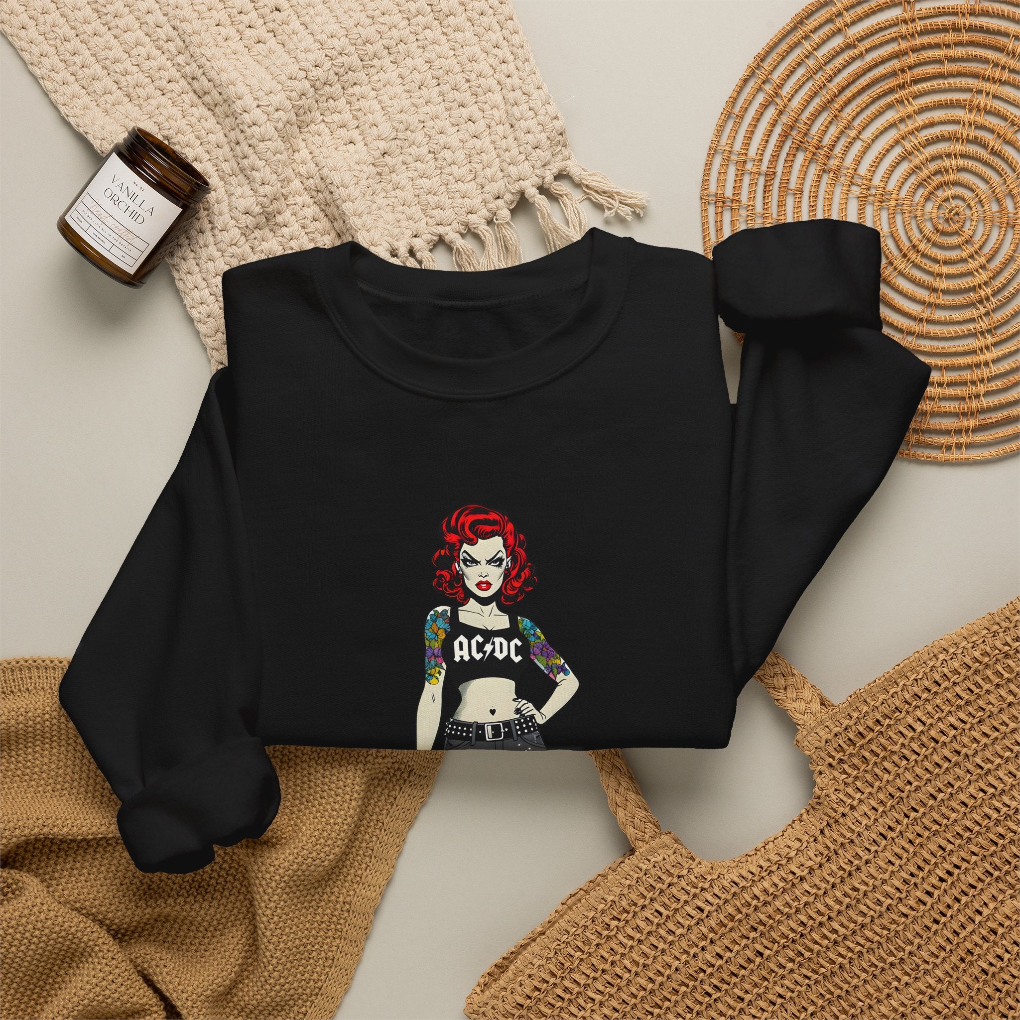 Black crewneck sweatshirt with long sleeves and front comic-style band character print