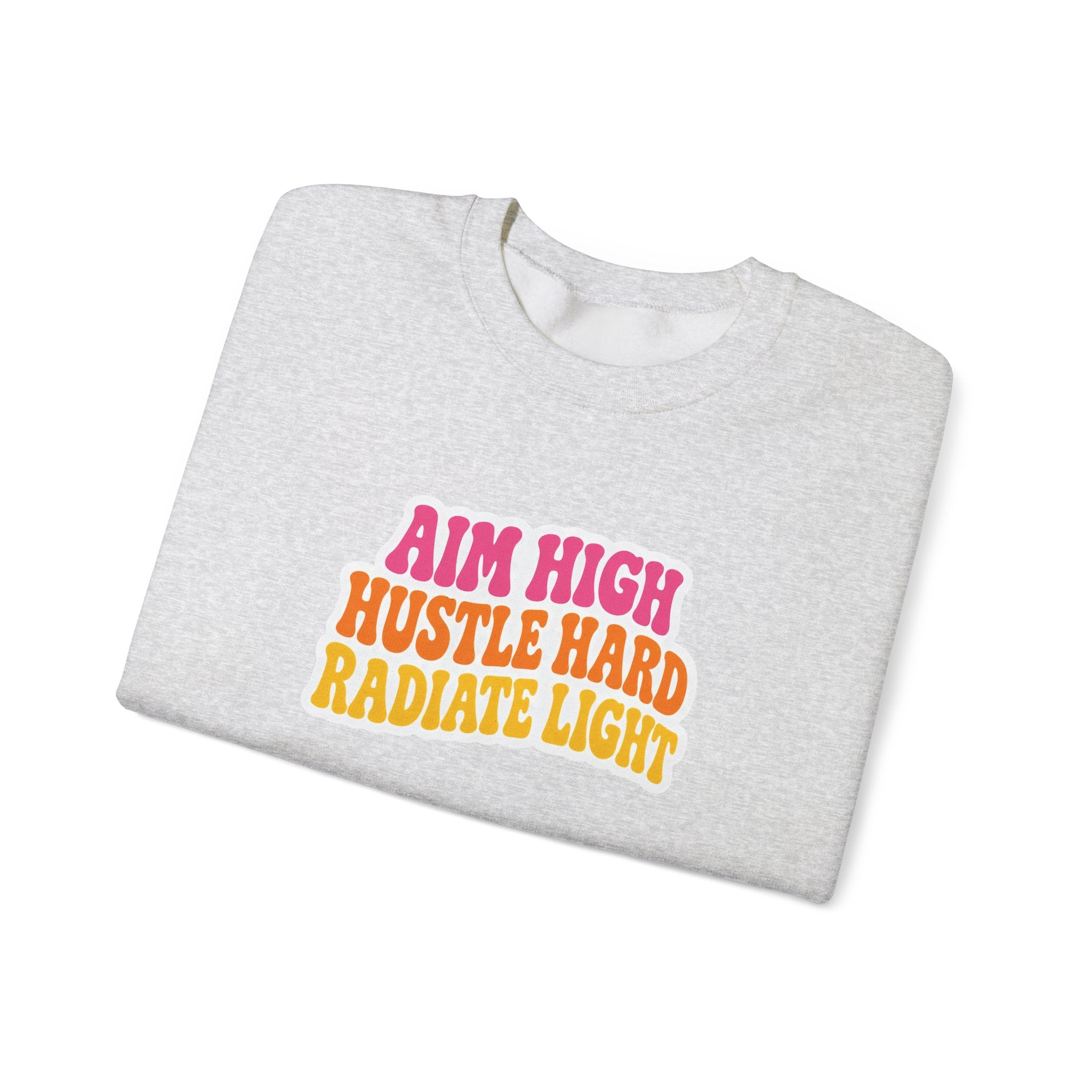 Aim High, Hustle Hard, Radiate Light Unisex Heavy Blend Crewneck Sweatshirt