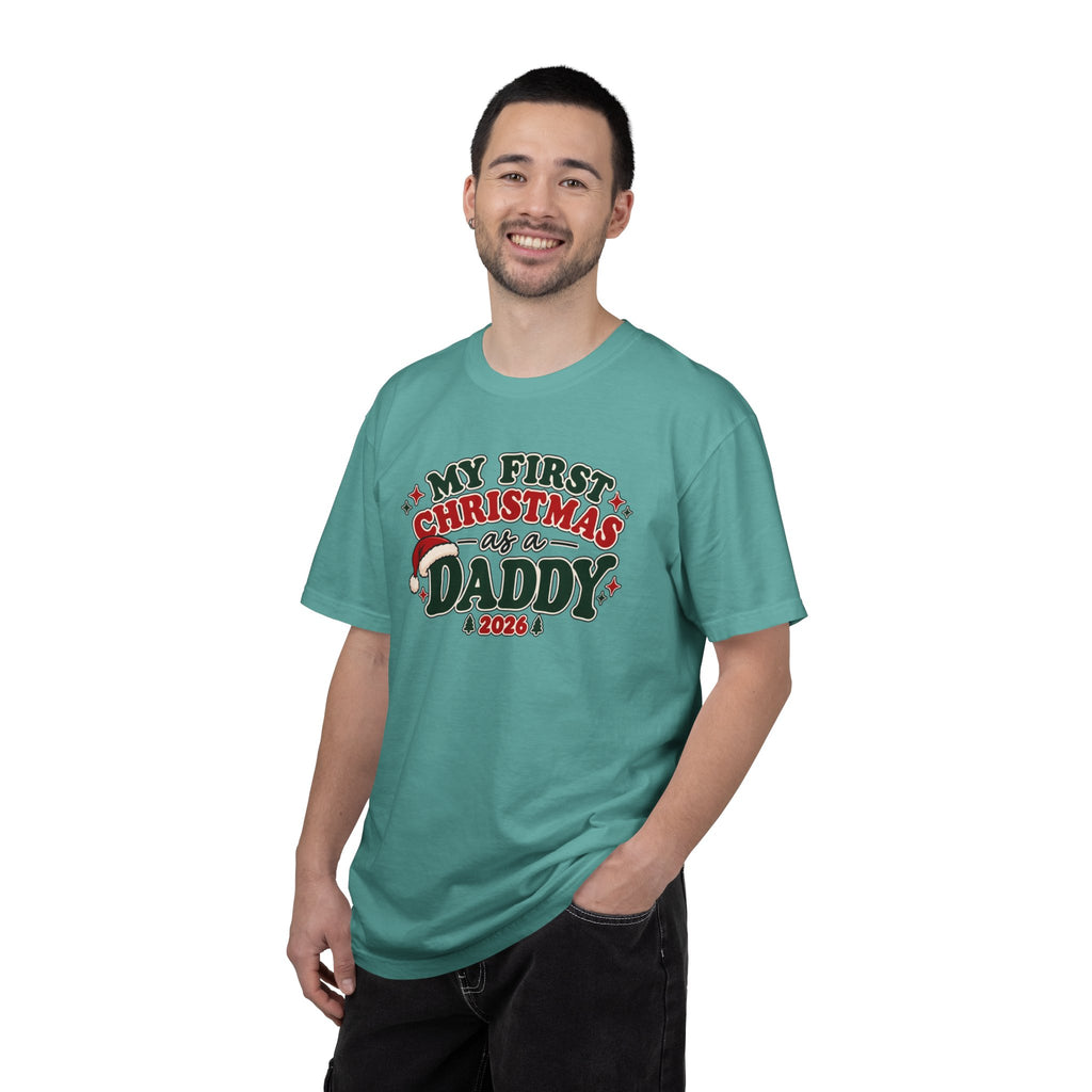 Man wearing teal T-shirt with “My First Christmas as a Daddy 2026” graphic