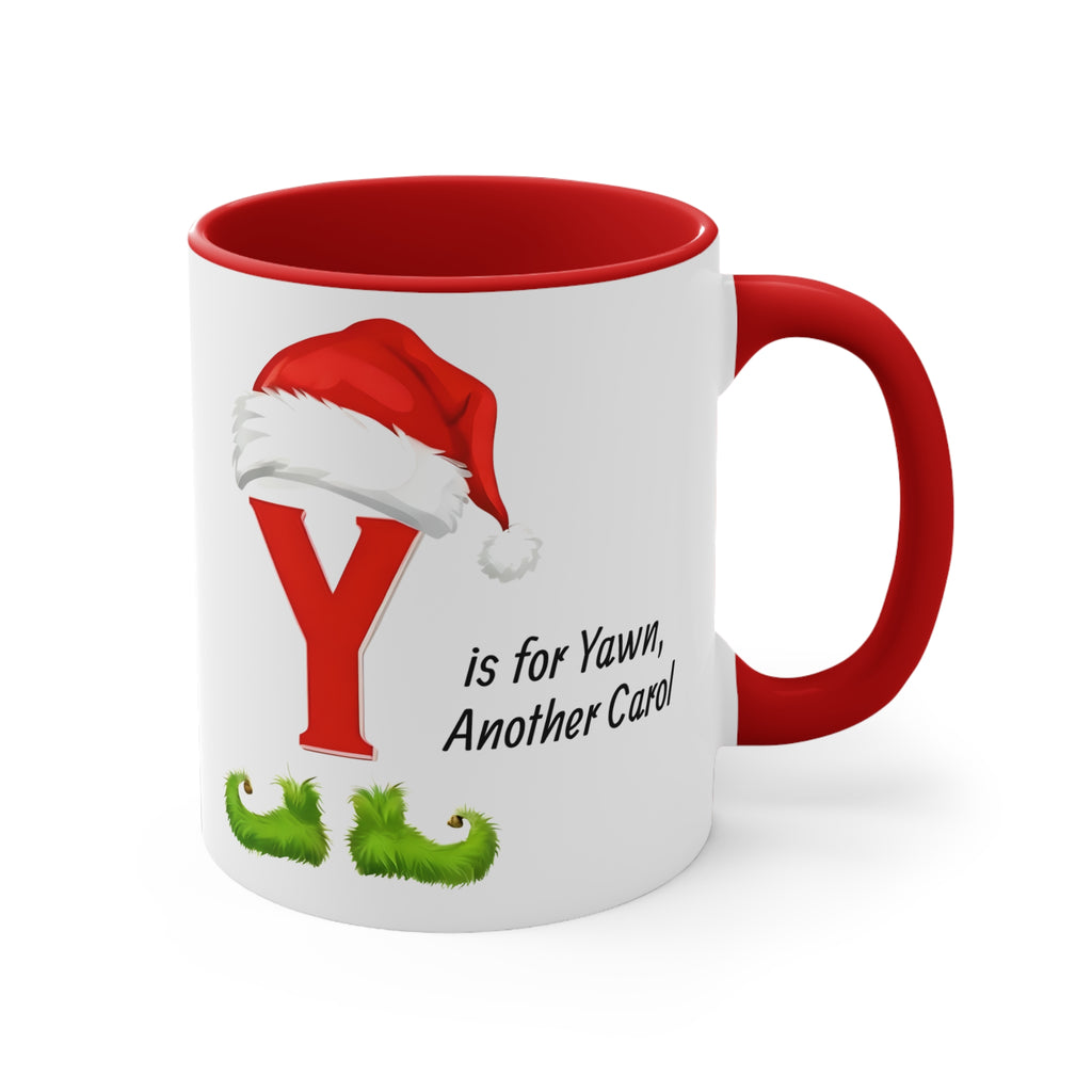 Red coffee mug with red interior, Santa hat over red Y, green feet, 'Another Carol' text